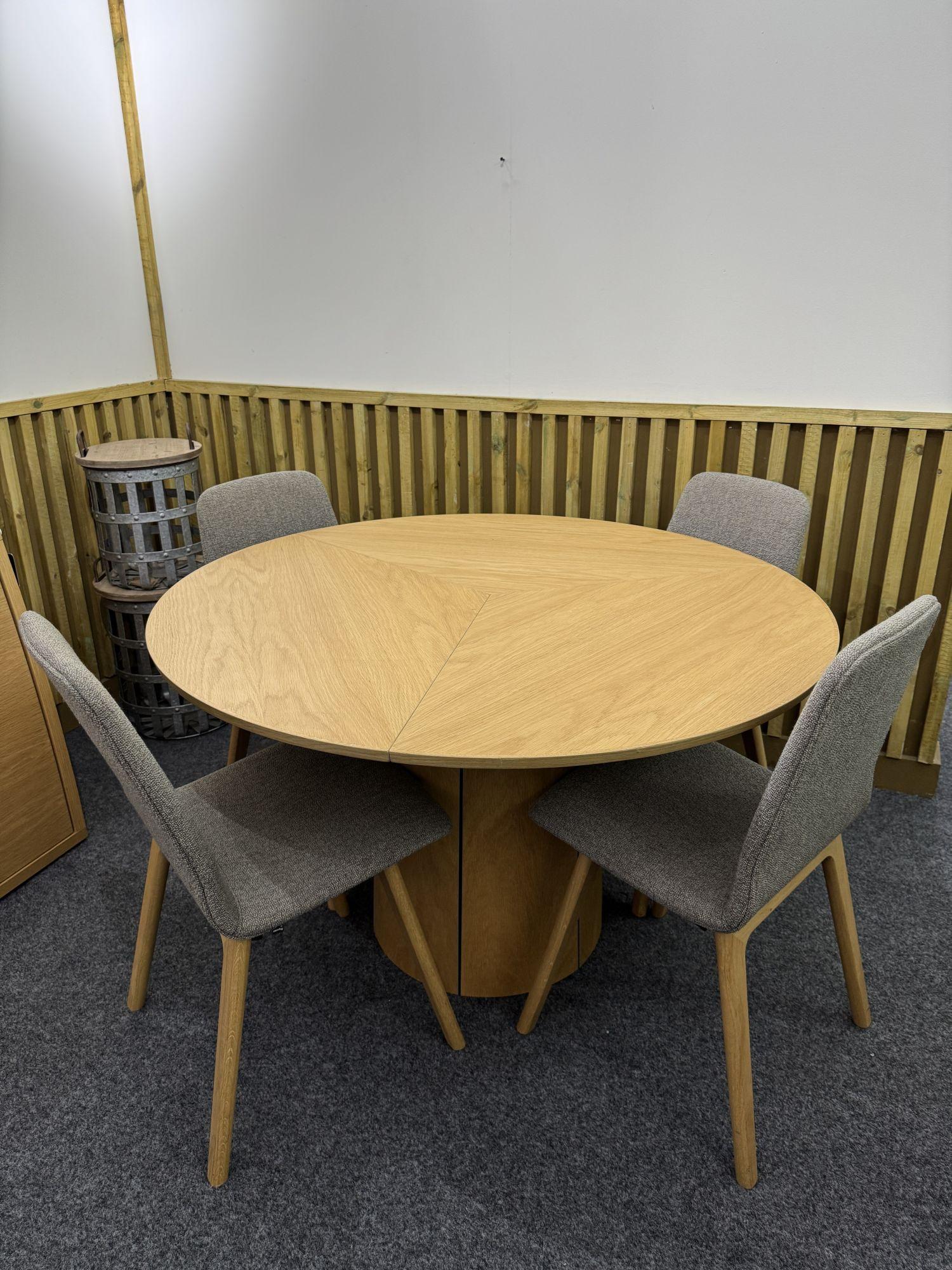 Product photograph of Ex Display - Skovby Sm33 Oak Round 4 Seater Extending Dining Set With Sm92 4 Chairs from Choice Furniture Superstore.