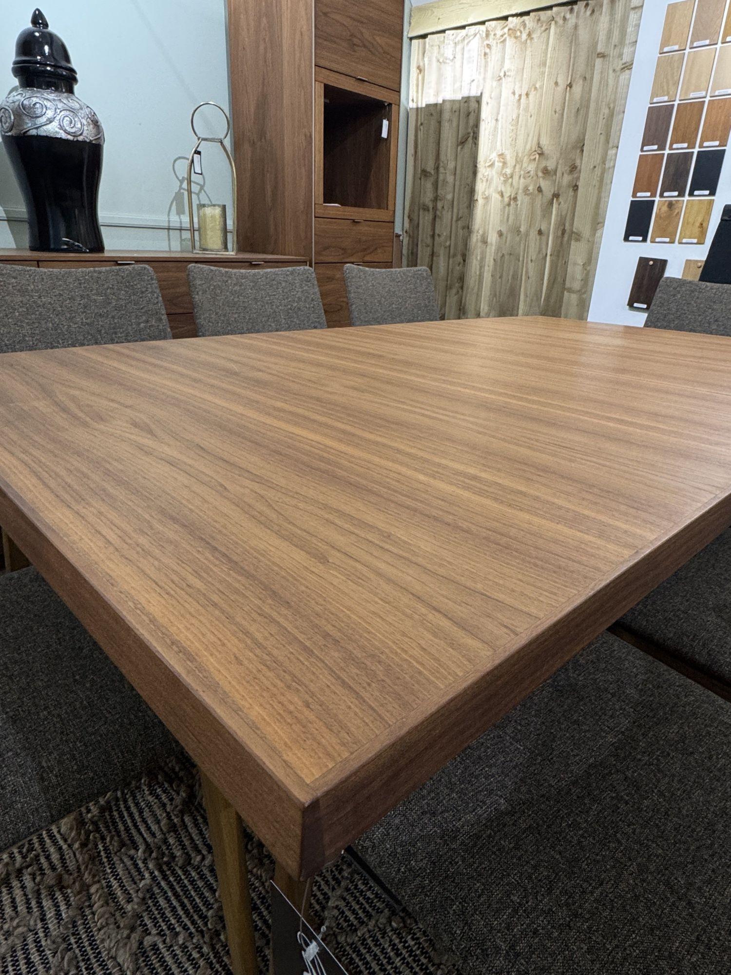 Product photograph of Ex Display - Skovby Sm37 Walnut 6-10 Seater Extending Dining Set With Sm63 8 Chairs from Choice Furniture Superstore.