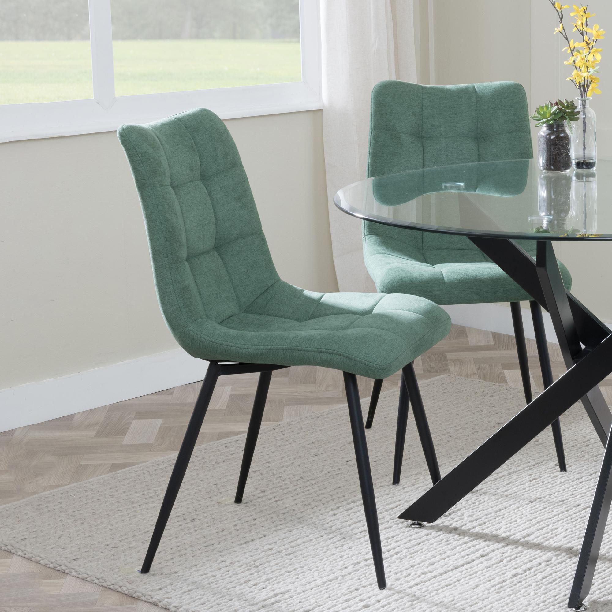 Product photograph of Chopstick Clear Glass And Black Metal 4 Seater Round Dining Set - 4 Corona Green Fabric Chairs from Choice Furniture Superstore.