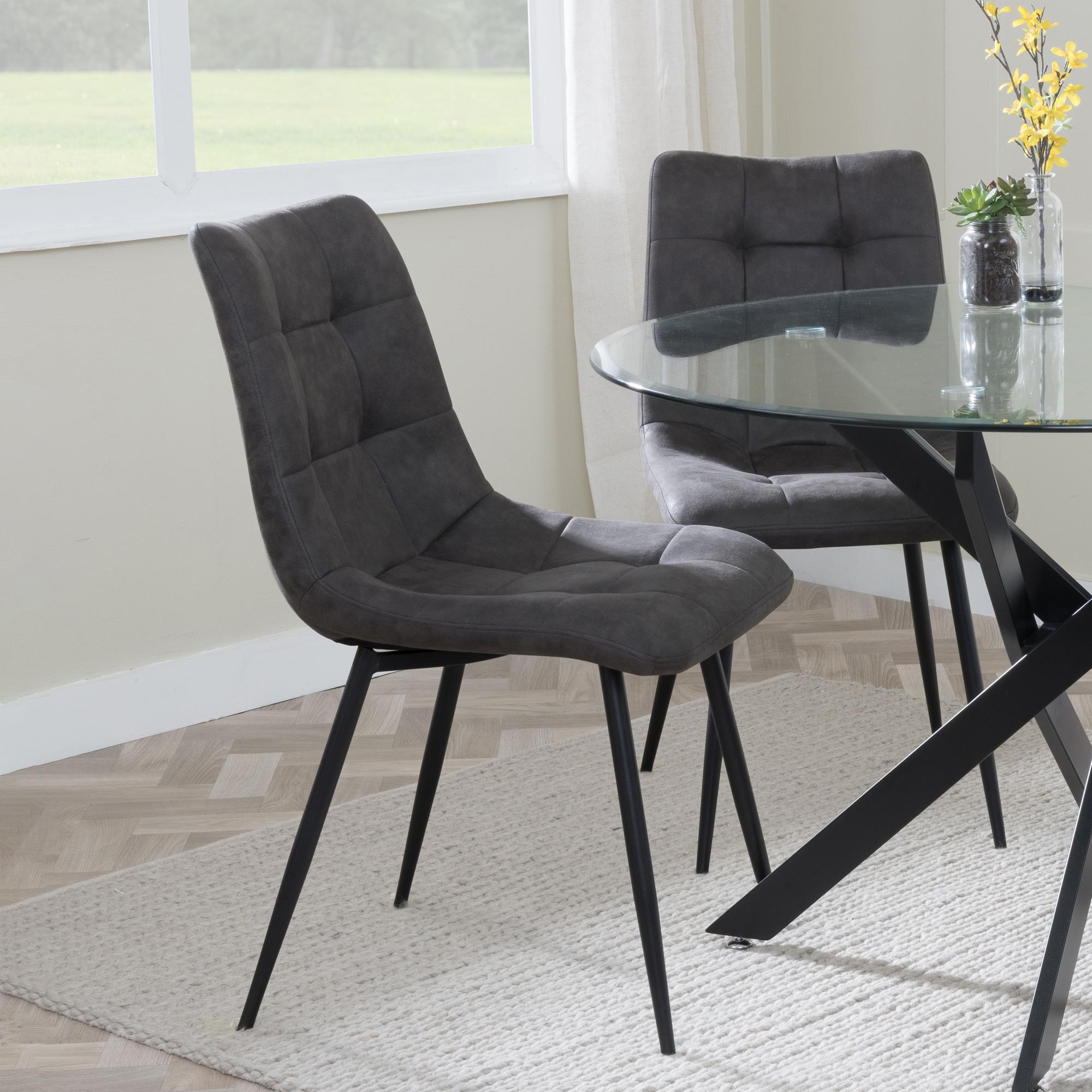 Product photograph of Chopstick Clear Glass And Black Metal 4 Seater Round Dining Set - 4 Corona Grey Fabric Chairs from Choice Furniture Superstore.