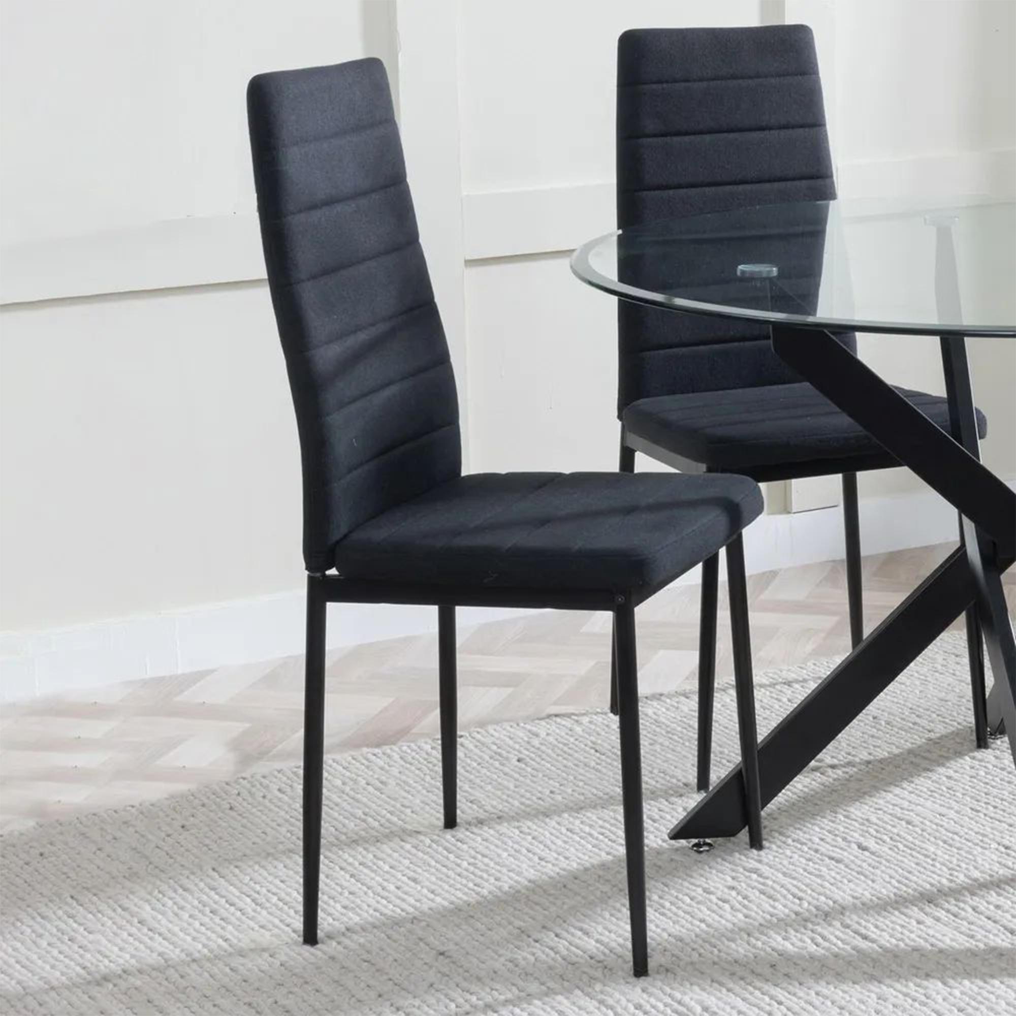 Product photograph of Chopstick Grey Glass And Black Metal 4 Seater Round Dining Set - 4 Lido Black Fabric Chairs With Black Legs from Choice Furniture Superstore.