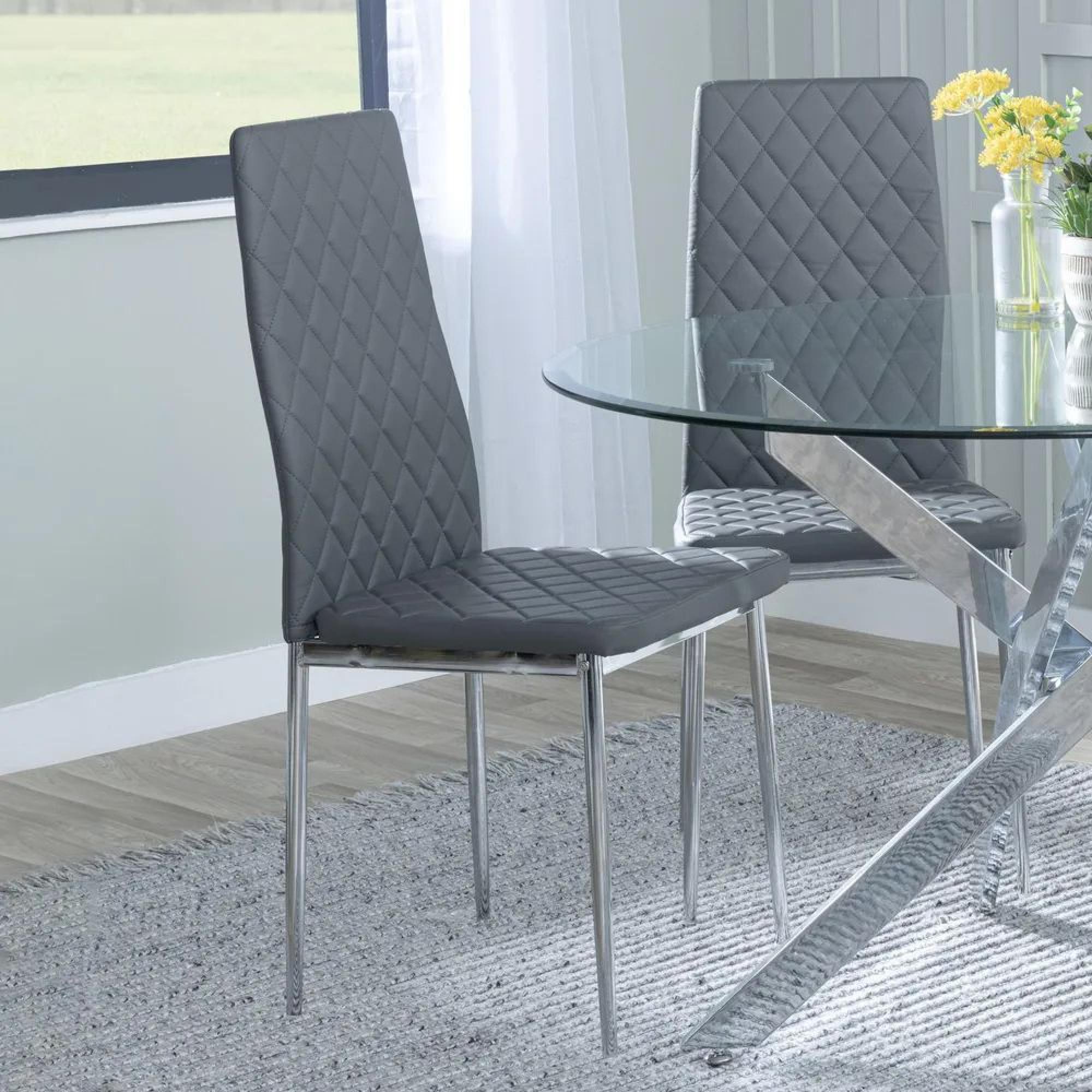 Product photograph of Chopstick Clear Glass And Chrome Metal Dining Set - Metro Grey Leather Chairs With Chrome Legs - Get 2 Chairs Free from Choice Furniture Superstore.