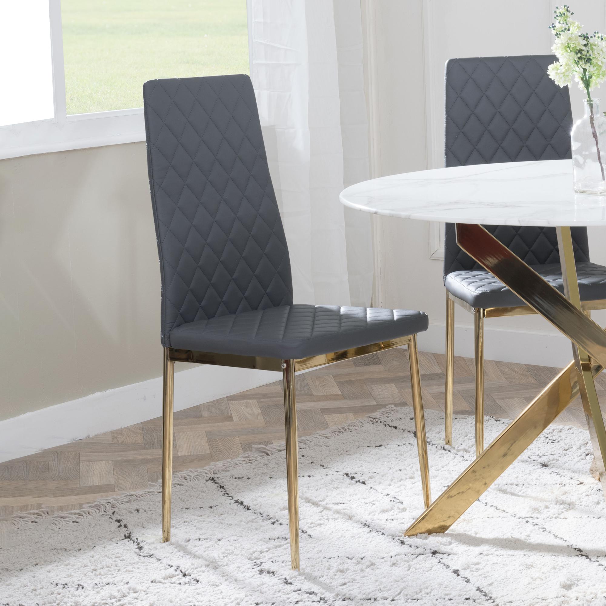 Product photograph of Chopstick Clear Glass And Gold Metal 4 Seater Round Dining Set - 2 Metro Grey Leather Chairs With Gold Legs - Get 2 Chairs Free from Choice Furniture Superstore.