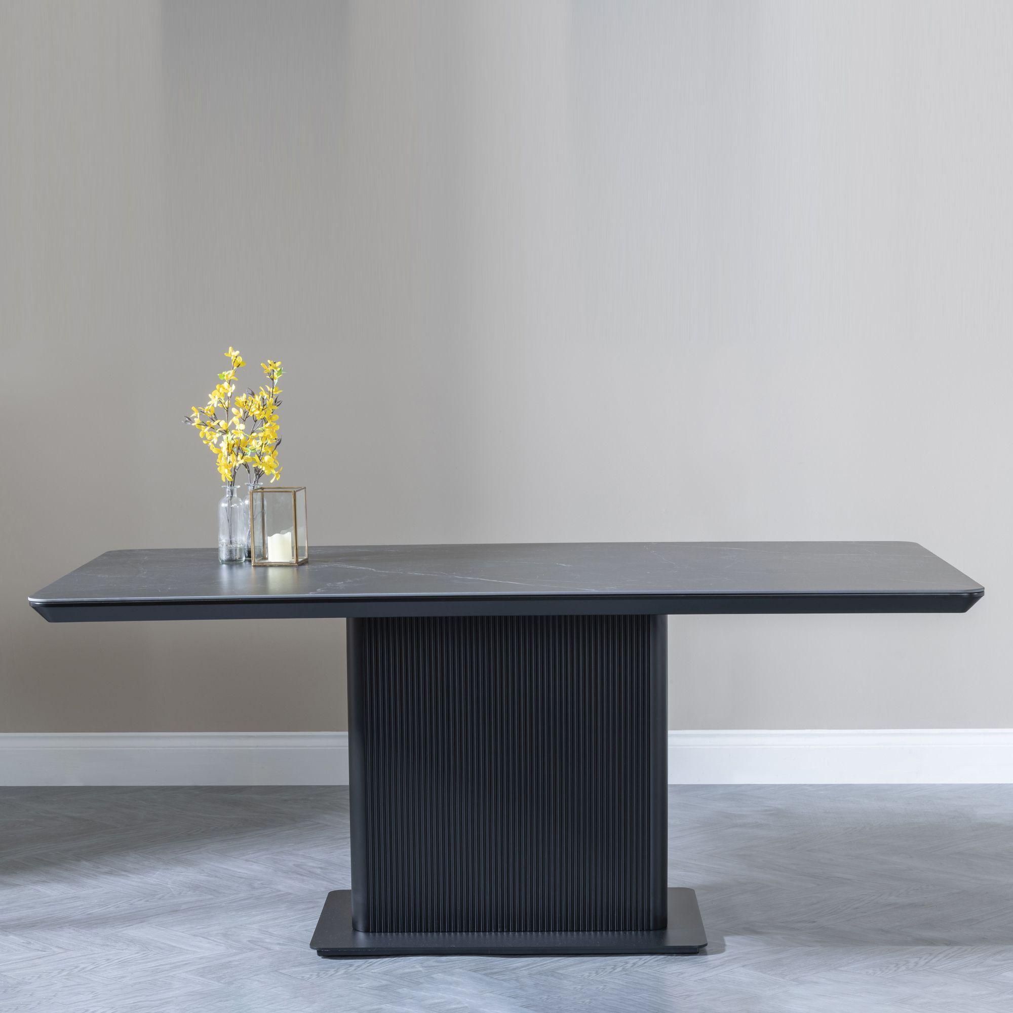 Product photograph of Morgan Black Ceramic Fluted Dining Set - Kiefer Grey Boucle Fabric Dining Chair from Choice Furniture Superstore.