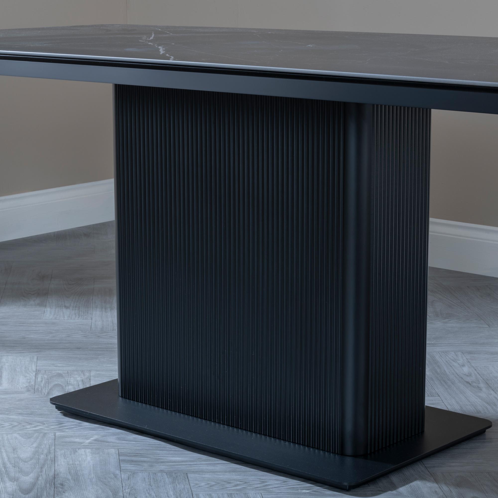 Product photograph of Morgan Black Ceramic Fluted Dining Set - Kiefer Grey Boucle Fabric Dining Chair from Choice Furniture Superstore.