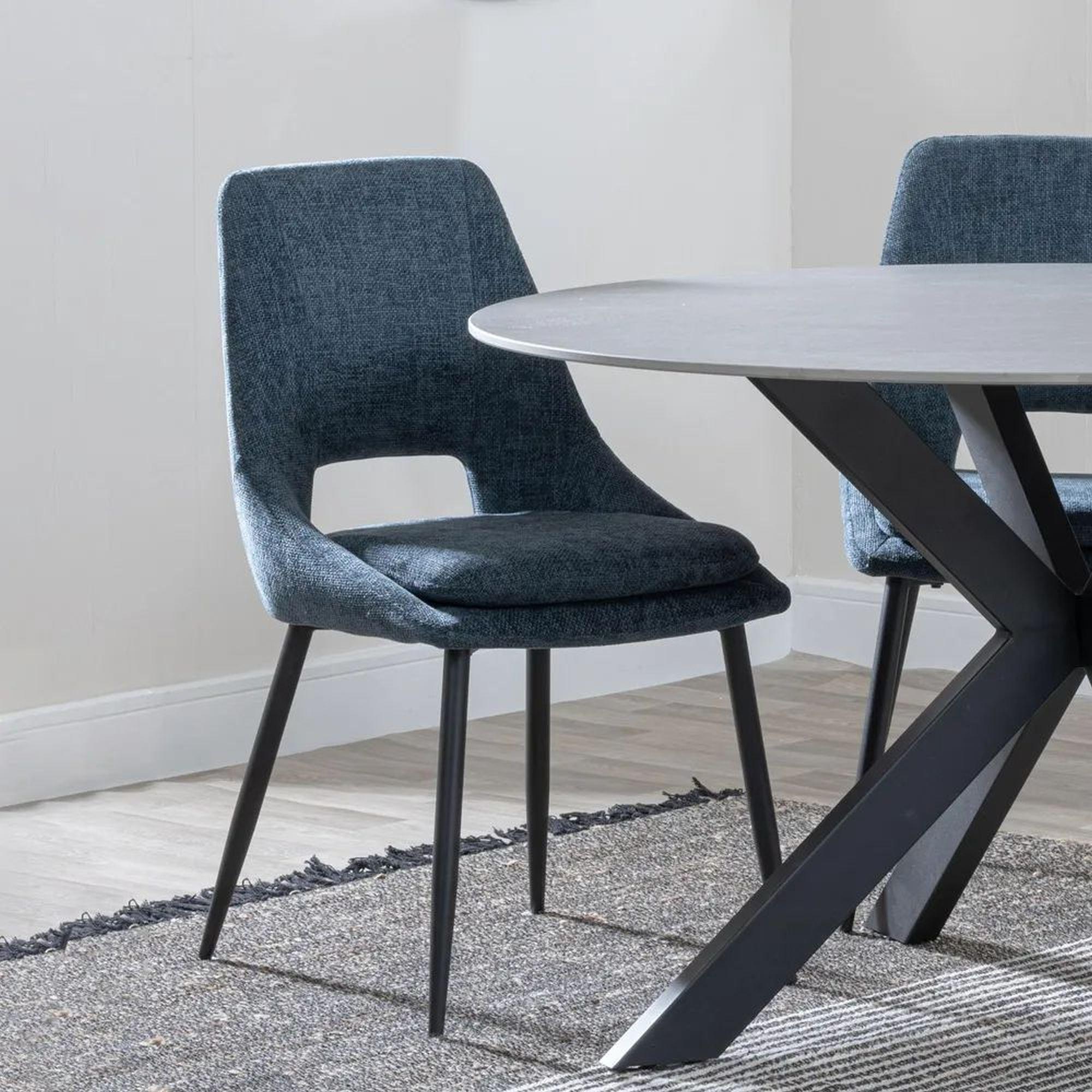 Product photograph of Danetti Dark Grey Ceramic Oval Dining Set With Bronze Pedestal Base - Peyton Blue Fabric Dining Chair from Choice Furniture Superstore.