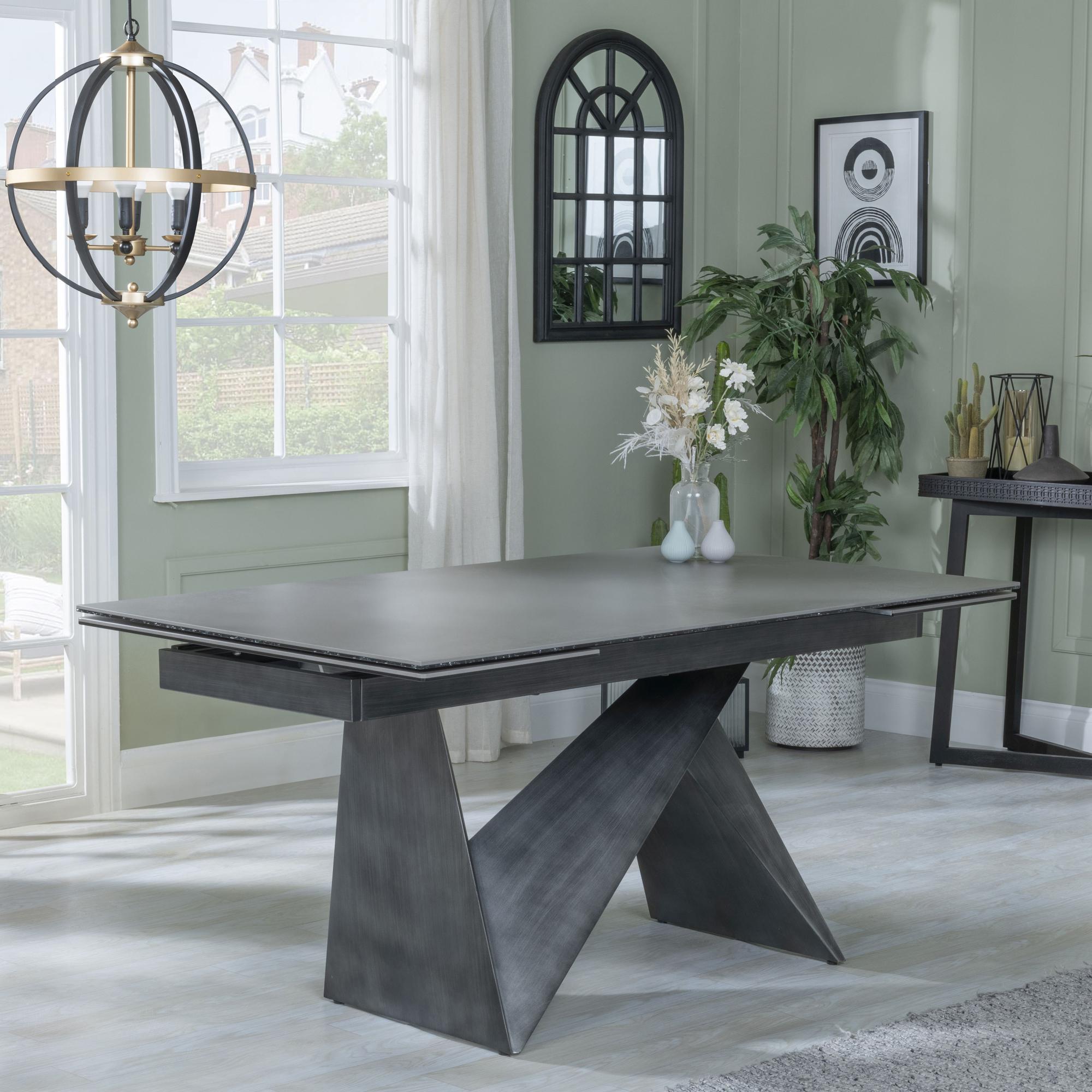 Product photograph of Garvin Dark Grey Ceramic Extending Dining Set - Ion Orange Velvet Fabric Swivel Dining Chair from Choice Furniture Superstore.