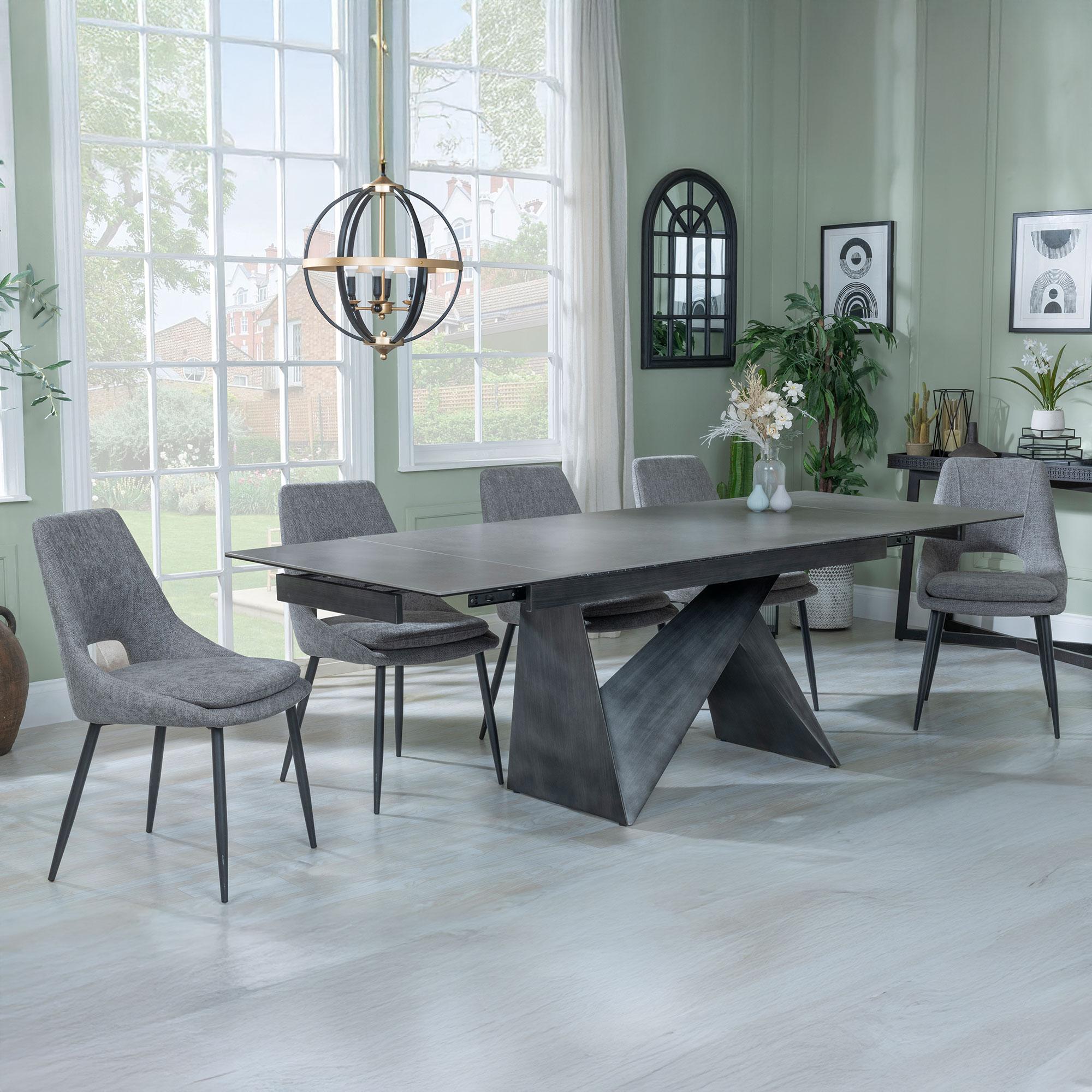 Product photograph of Garvin Dark Grey Ceramic Extending Dining Set - Peyton Grey Fabric Dining Chair from Choice Furniture Superstore.