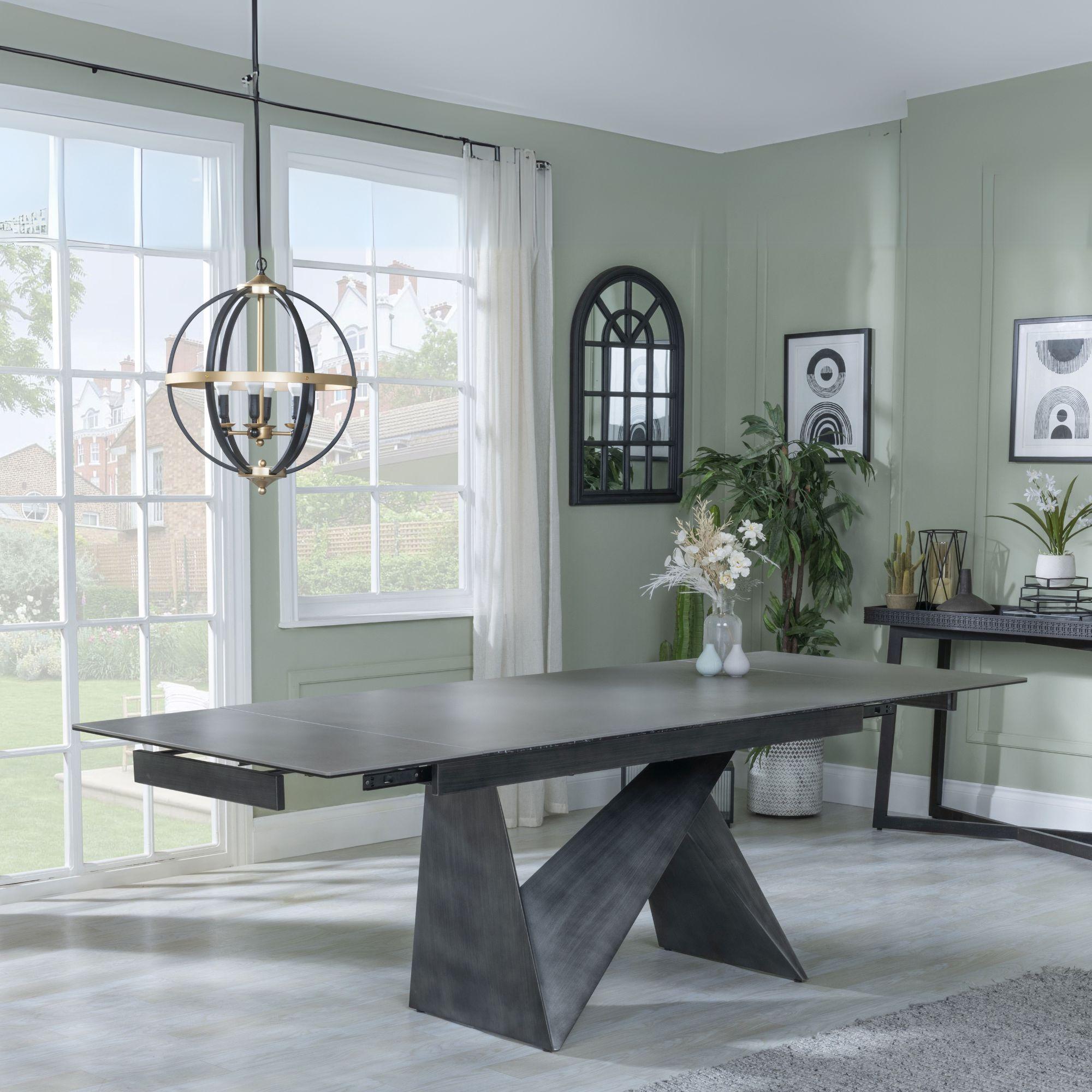 Product photograph of Garvin Dark Grey Ceramic Extending Dining Set - Peyton Green Fabric Dining Chair from Choice Furniture Superstore.