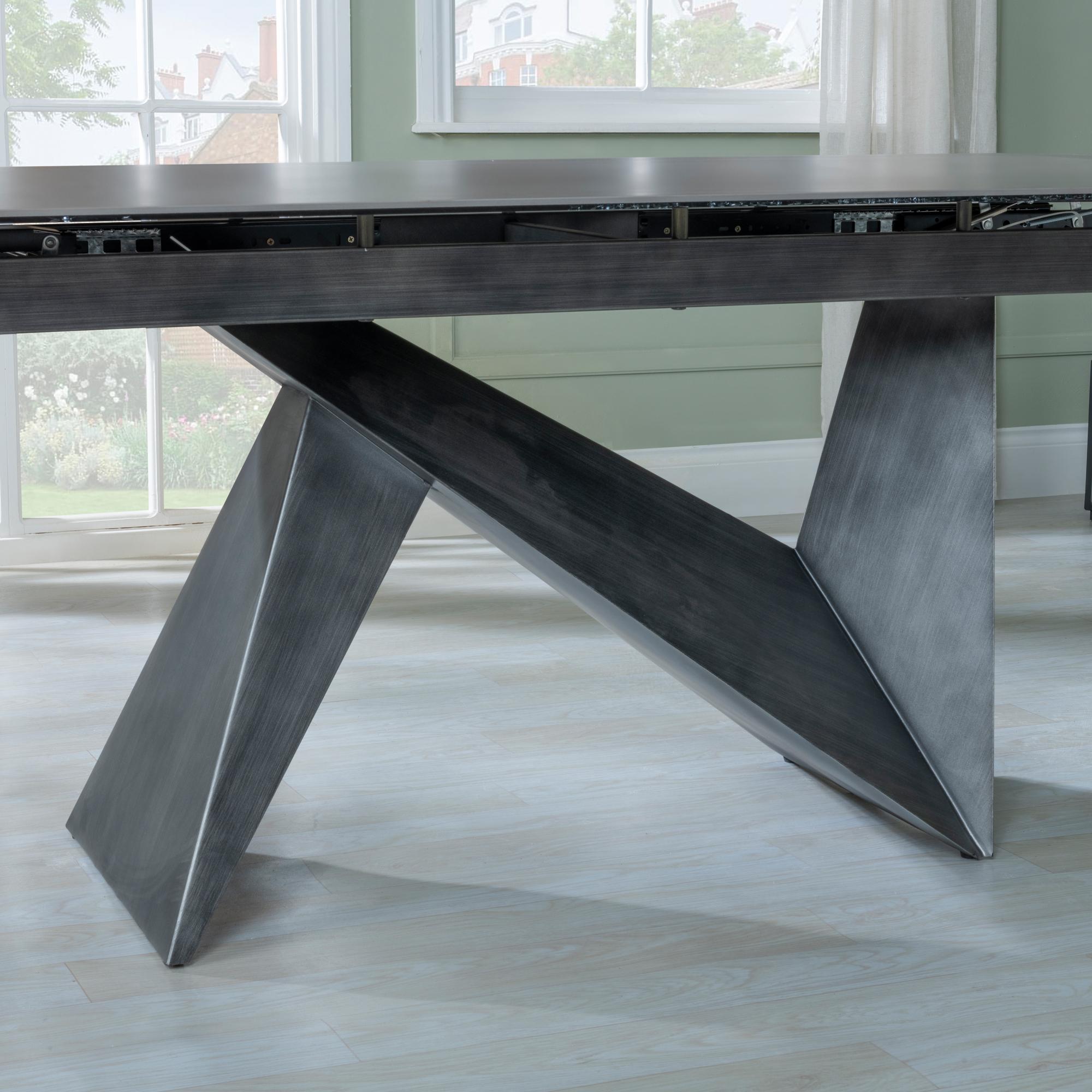 Product photograph of Garvin Dark Grey Ceramic Extending Dining Set - Peyton Green Fabric Dining Chair from Choice Furniture Superstore.