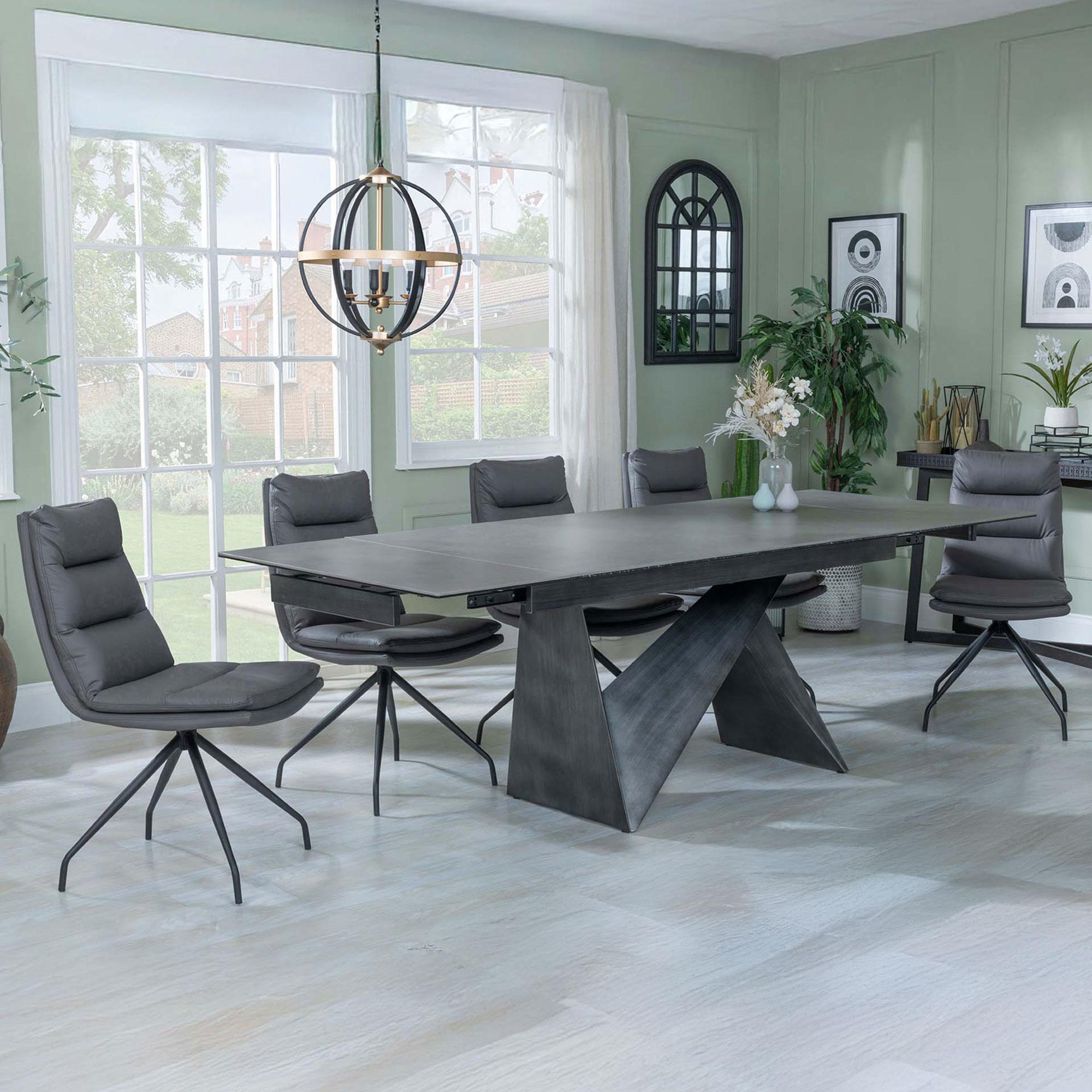 Product photograph of Garvin Dark Grey Ceramic Extending Dining Set - Diego Grey Leather Swivel Dining Chair from Choice Furniture Superstore.