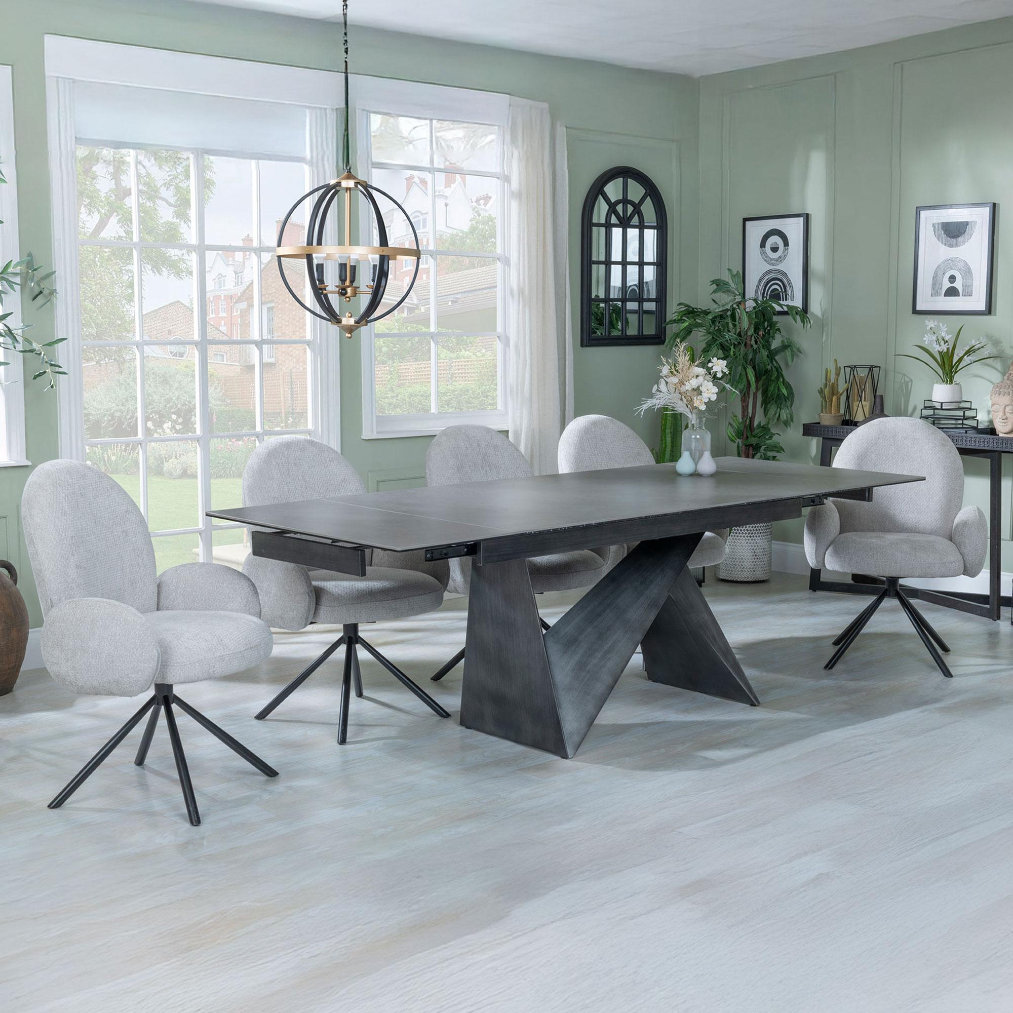 Product photograph of Garvin Dark Grey Ceramic Extending Dining Set - Theo Grey Fabric Swivel Dining Chair from Choice Furniture Superstore.