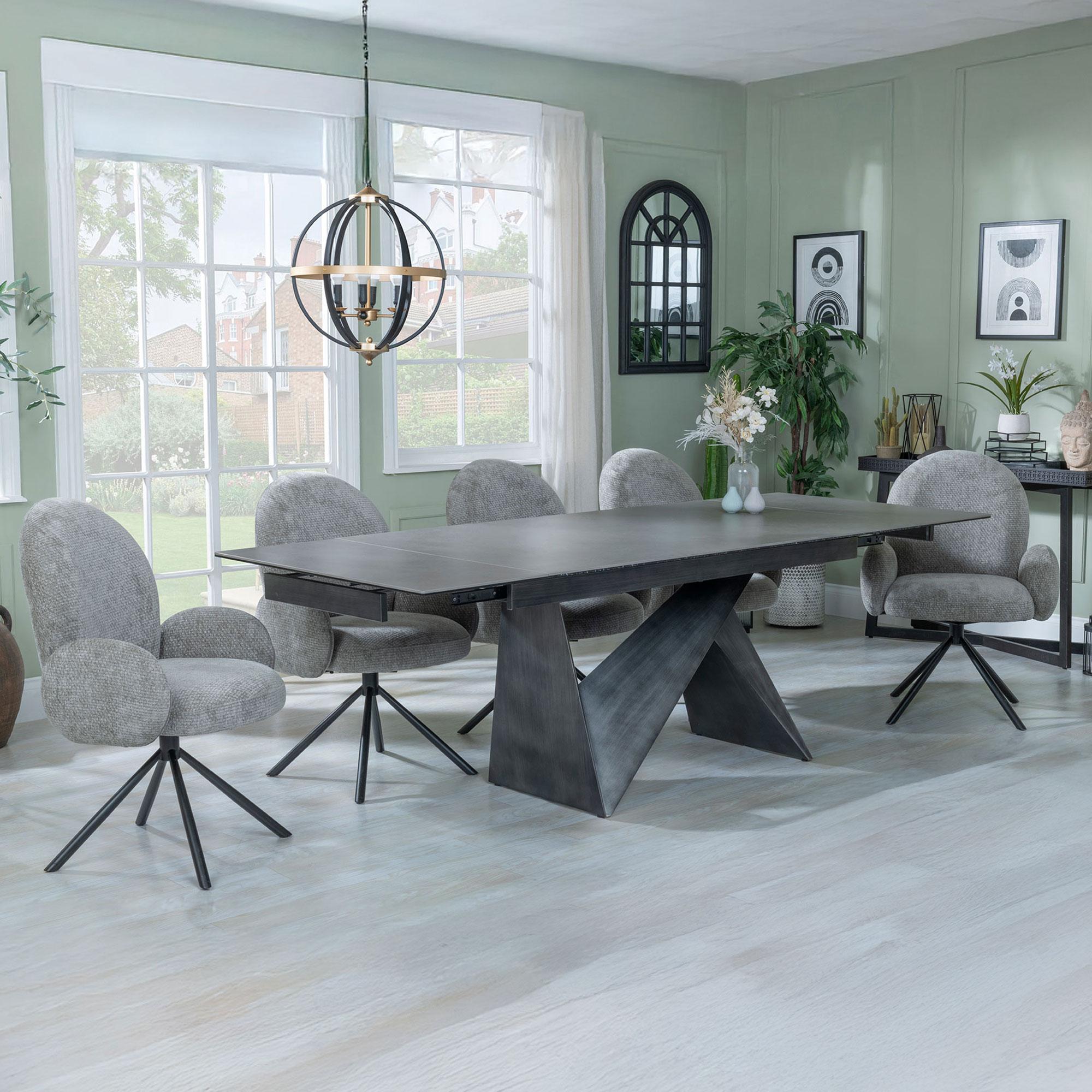 Product photograph of Garvin Dark Grey Ceramic Extending Dining Set - Theo Dark Grey Fabric Swivel Dining Chair from Choice Furniture Superstore.