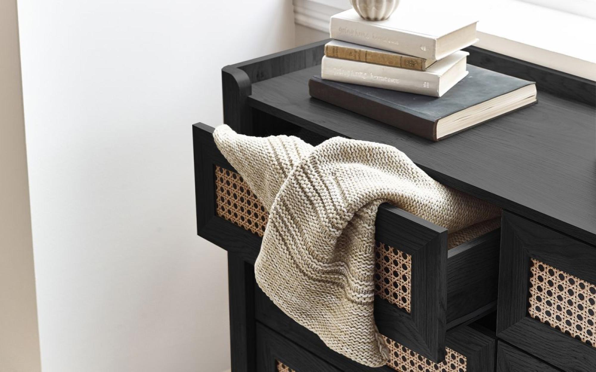 Product photograph of Sydney Black And Faux Rattan 6 Drawer Wide Chest from Choice Furniture Superstore.