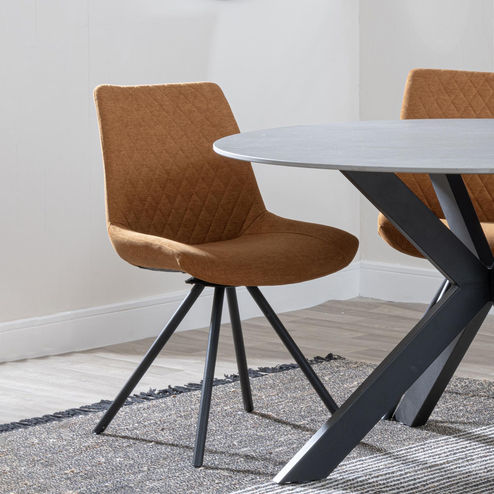 Product photograph of Ezra Grey Concrete Effect Dining Set With Cross Legs - Boden Orange Fabric Swivel Dining Chair from Choice Furniture Superstore.