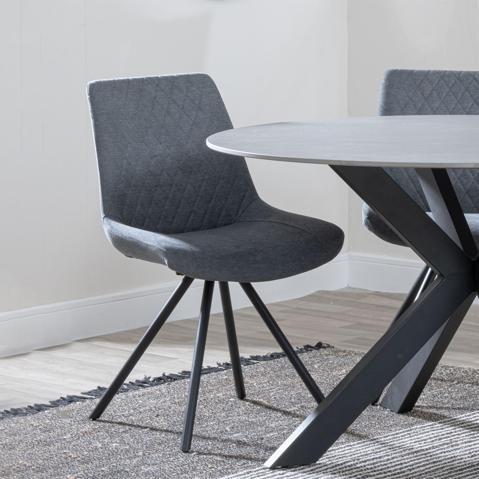 Product photograph of Ezra Grey Concrete Effect Dining Set With Cross Legs - Boden Grey Fabric Swivel Dining Chair from Choice Furniture Superstore.