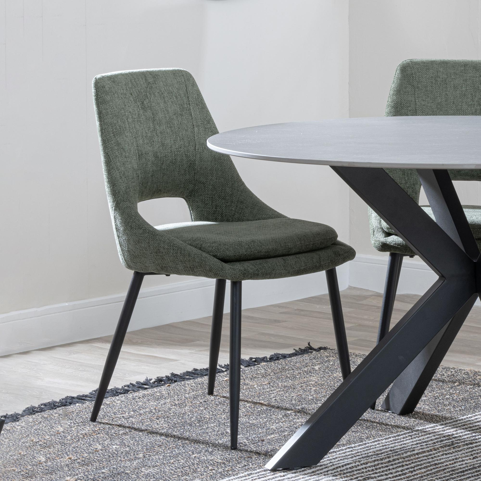 Product photograph of Ezra Grey Concrete Effect Dining Set With Cross Legs - Peyton Green Fabric Dining Chair from Choice Furniture Superstore.