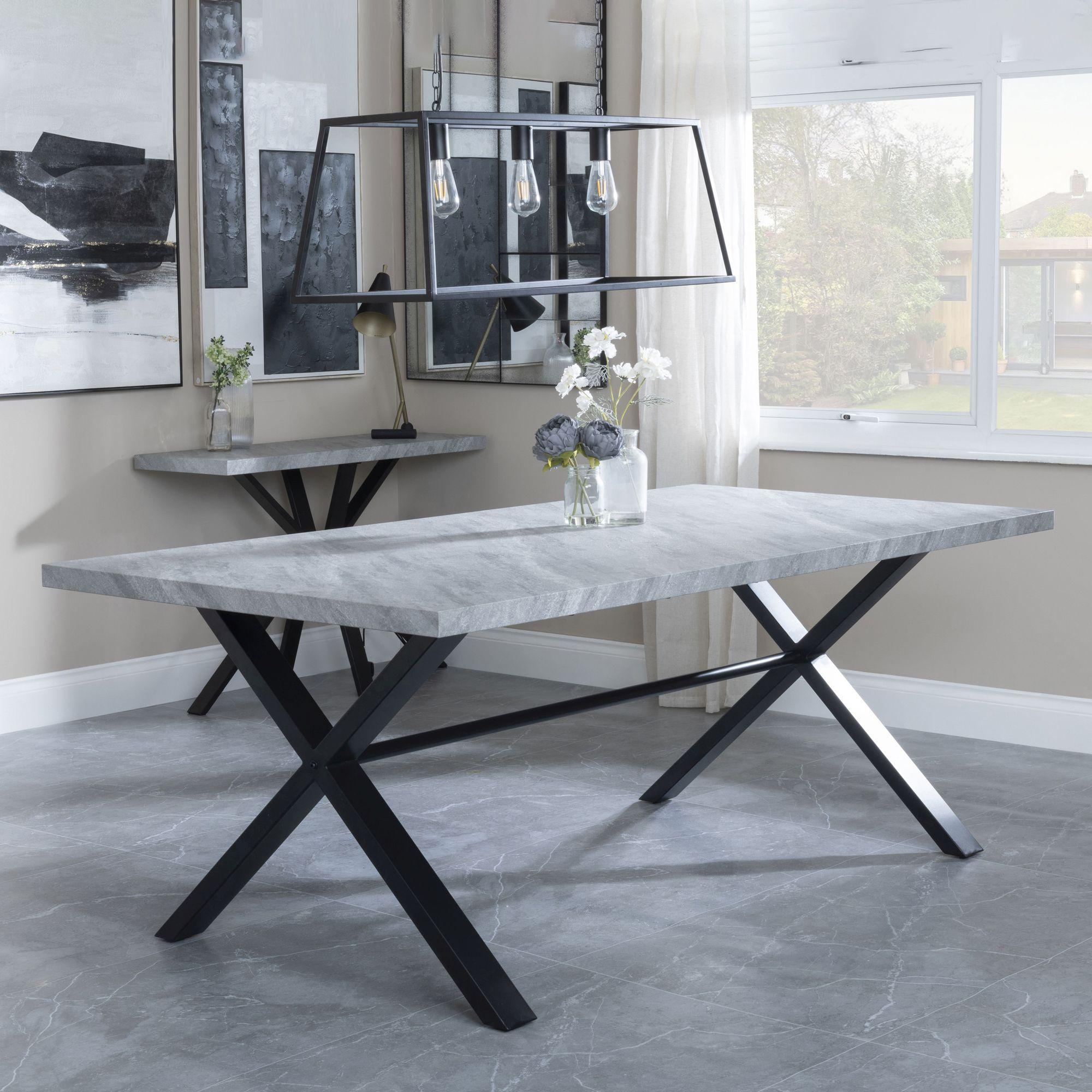 Product photograph of Ezra Grey Concrete Effect Dining Set With Cross Legs - Theo Grey Fabric Swivel Dining Chair from Choice Furniture Superstore.