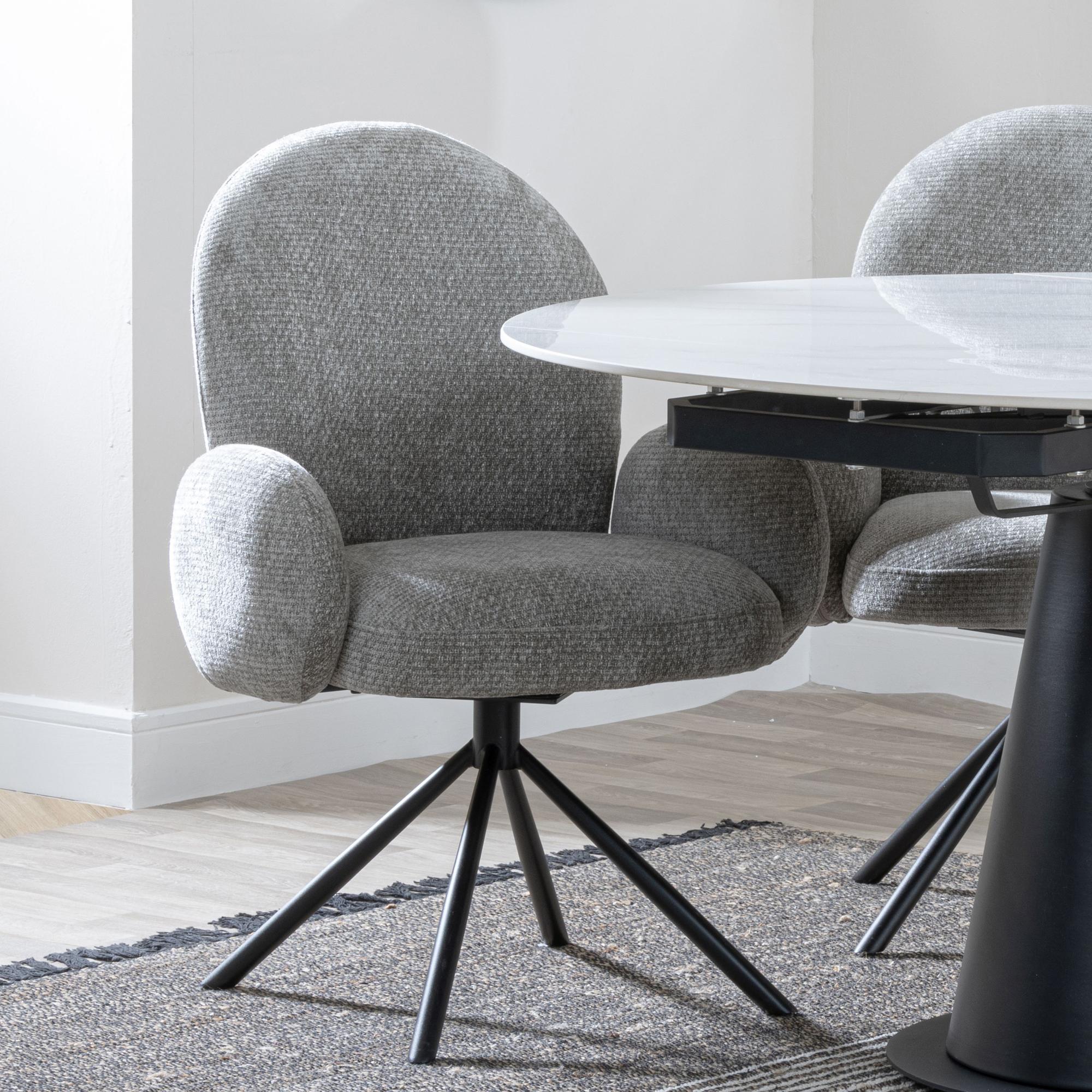 Product photograph of Ezra Grey Concrete Effect Dining Set With Cross Legs - Theo Dark Grey Fabric Swivel Dining Chair from Choice Furniture Superstore.