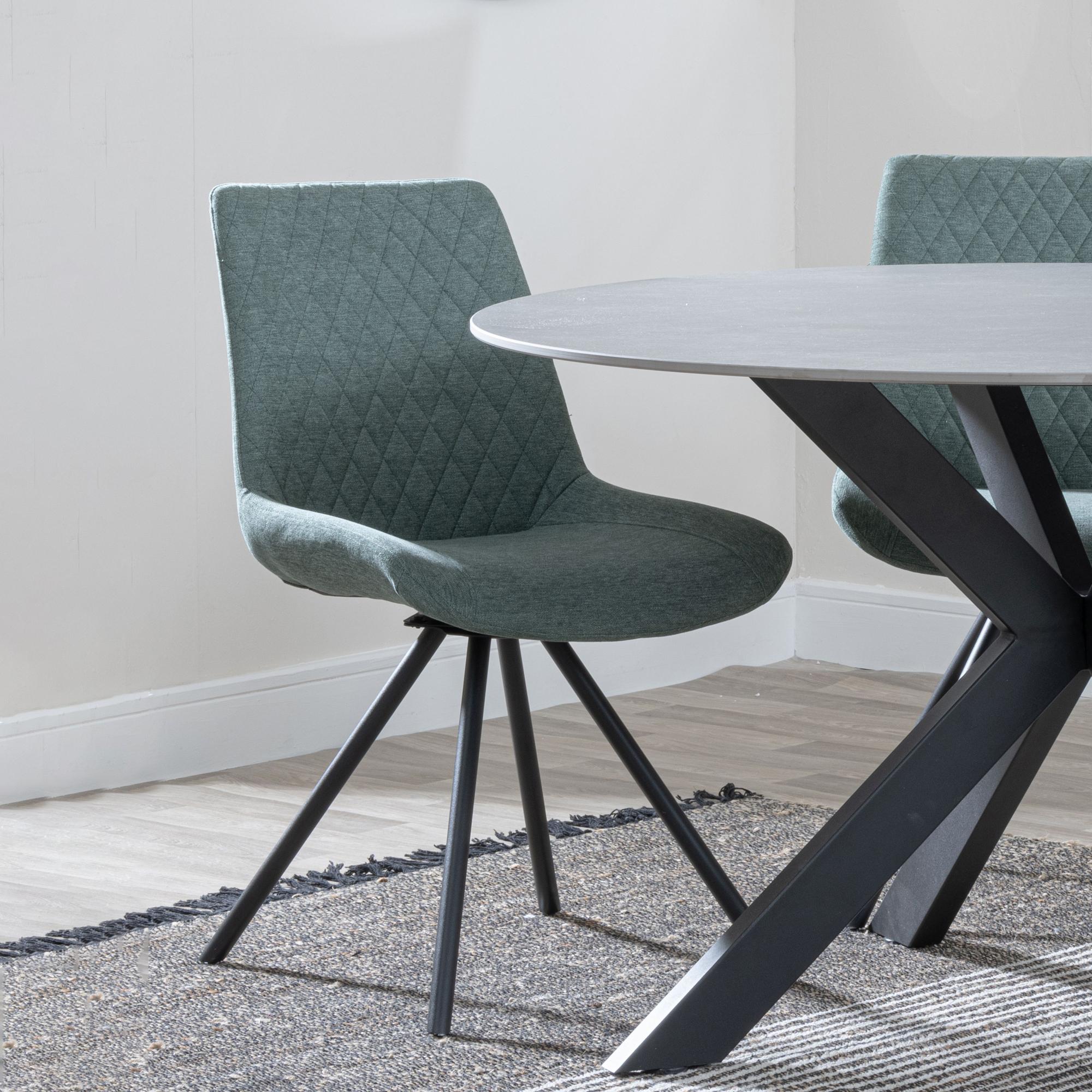 Product photograph of Ezra Grey Concrete Effect Dining Set With Spider Legs - Boden Green Fabric Swivel Dining Chair from Choice Furniture Superstore.