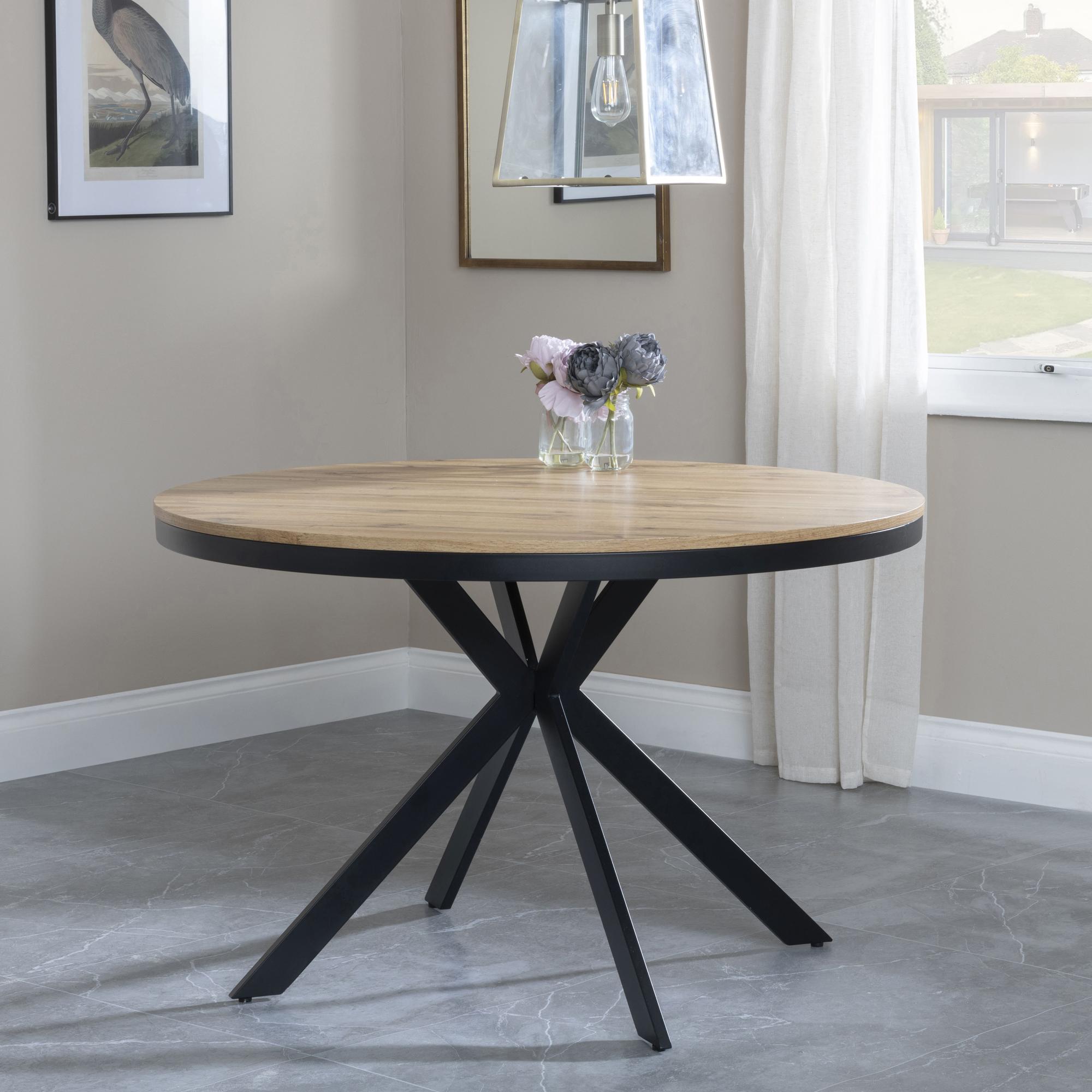 Product photograph of Ezra Industrial Oak Effect 4 Seater Round Dining Set With Spider Legs - 4 Corona Green Fabric Dining Chair from Choice Furniture Superstore.