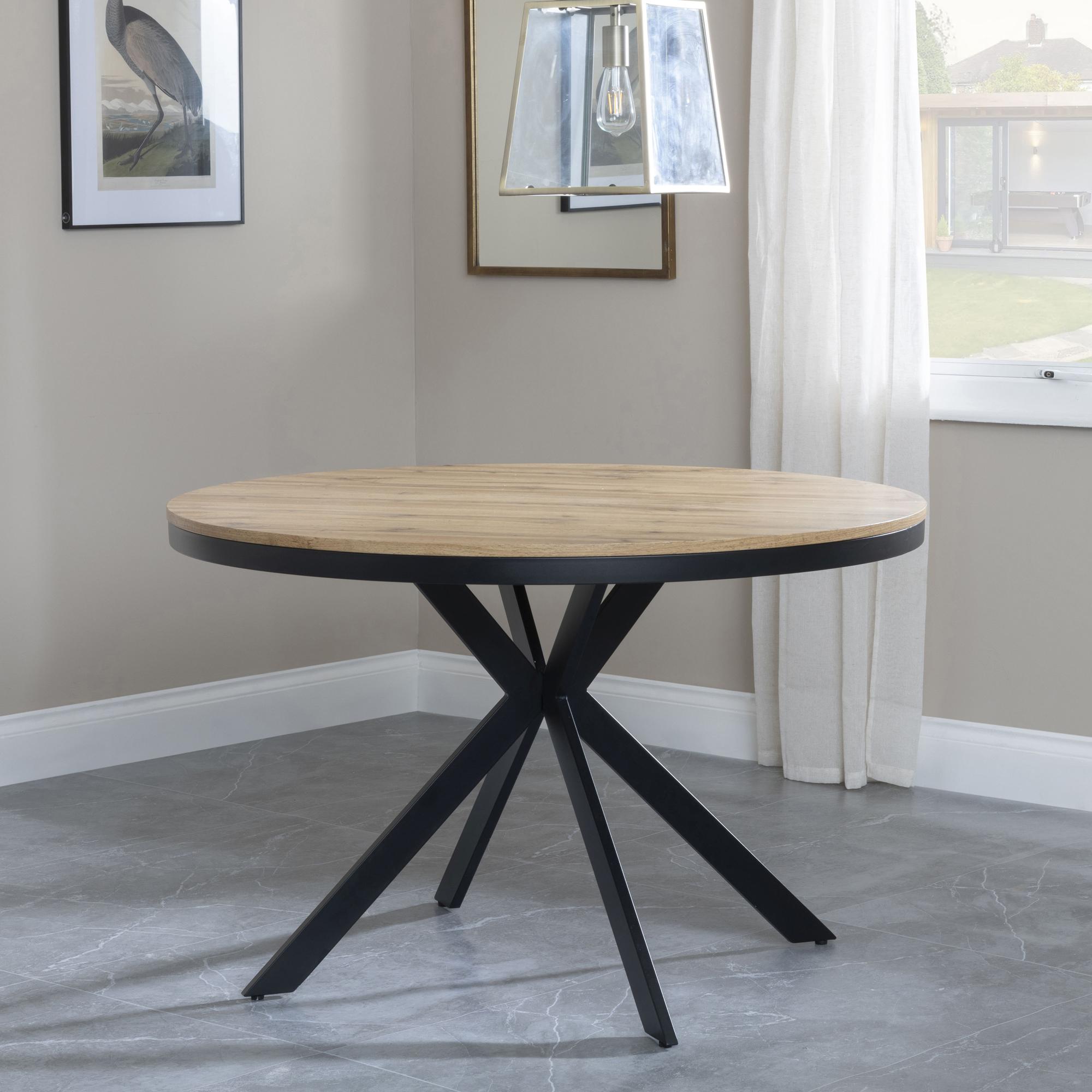 Product photograph of Ezra Industrial Oak Effect 4 Seater Round Dining Set With Spider Legs - 4 Corona Green Fabric Dining Chair from Choice Furniture Superstore.