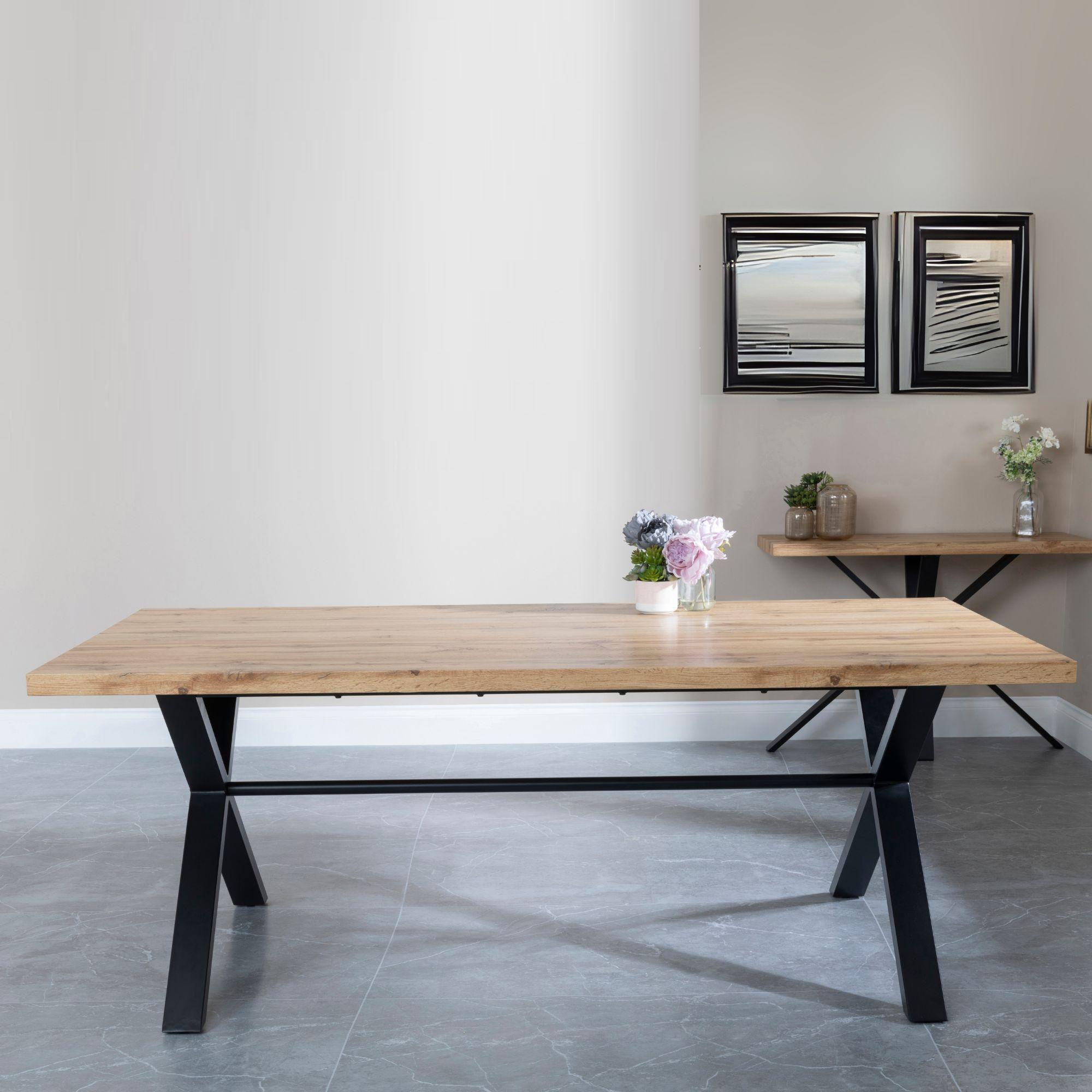 Product photograph of Ezra Industrial Oak Effect Dining Set With Cross Legs - Darwin Cream Fabric Dining Chair from Choice Furniture Superstore.