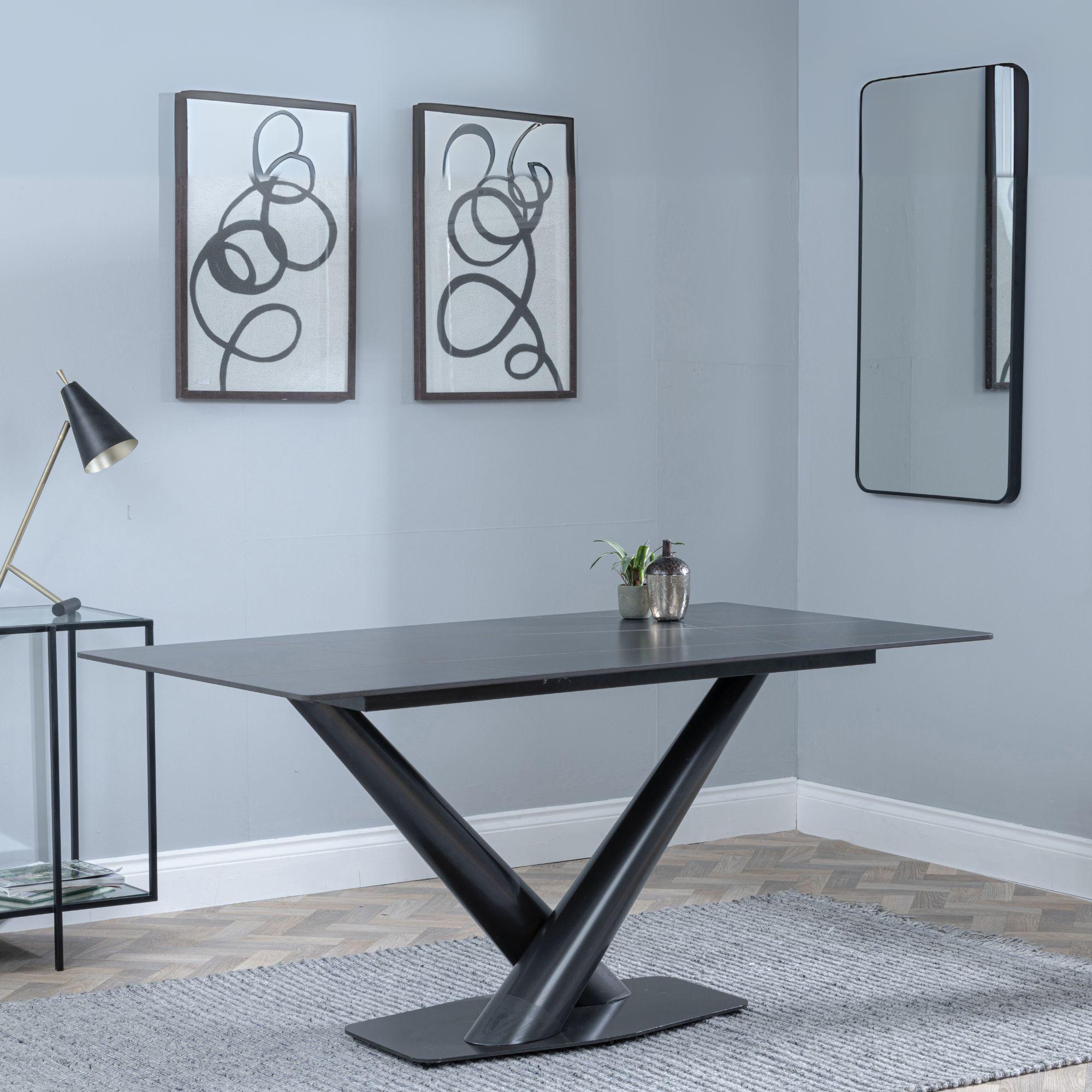 Product photograph of Maldon Black Ceramic Dining Set - Metro White Leather Dining Chair With Black Legs from Choice Furniture Superstore.