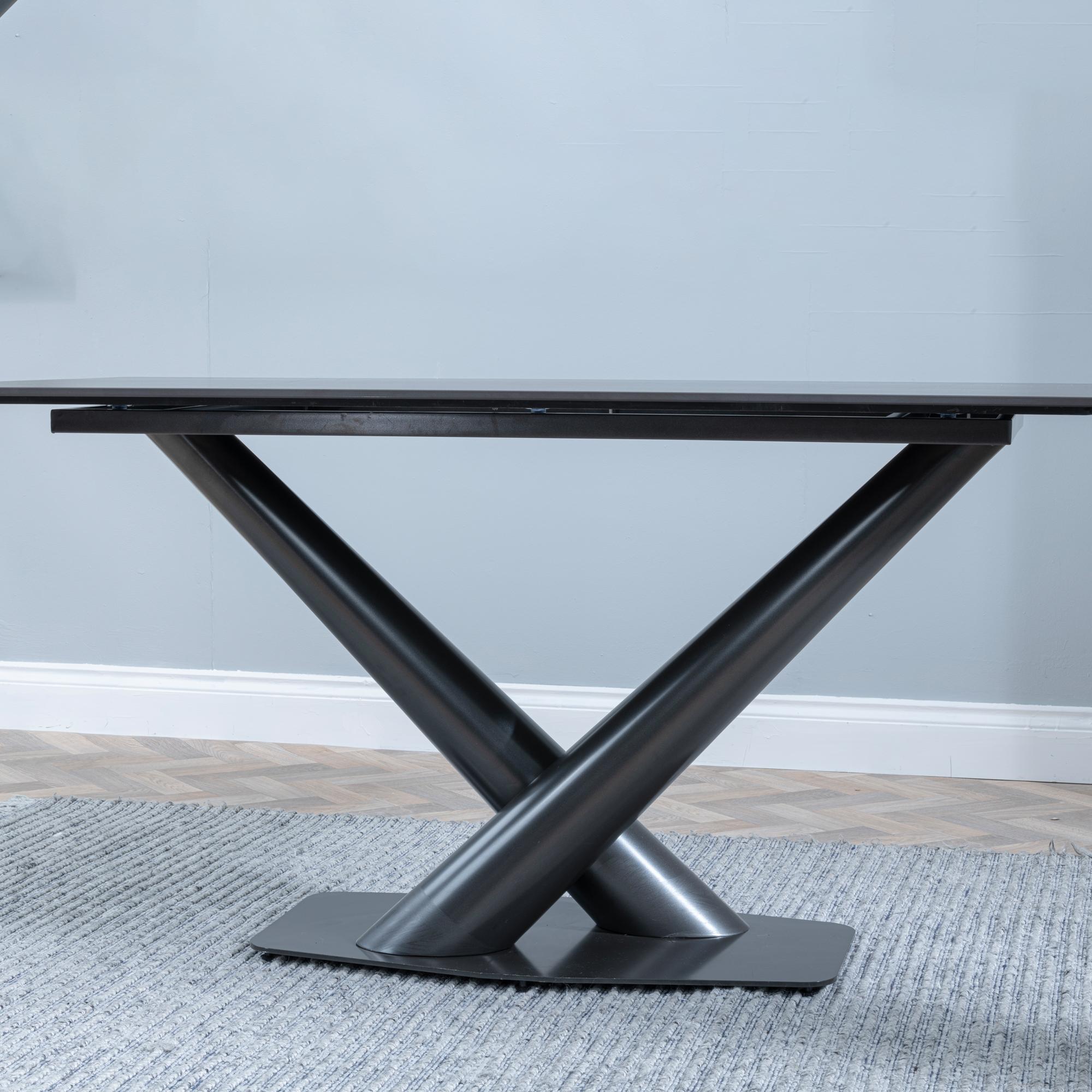 Product photograph of Maldon Black Ceramic Dining Set - Metro White Leather Dining Chair With Black Legs from Choice Furniture Superstore.