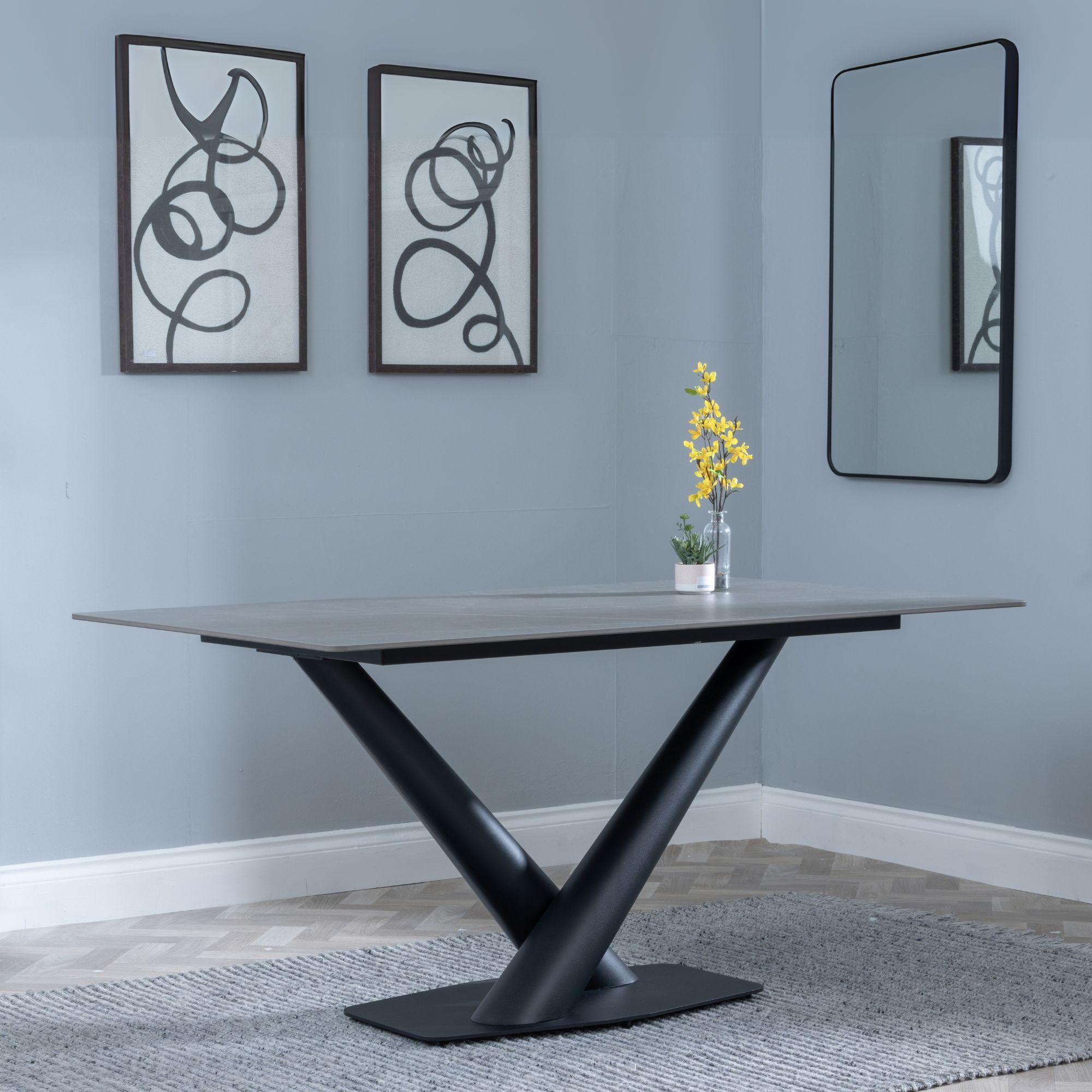 Product photograph of Maldon Grey Ceramic Dining Set - Metro White Leather Dining Chair With Black Legs from Choice Furniture Superstore.