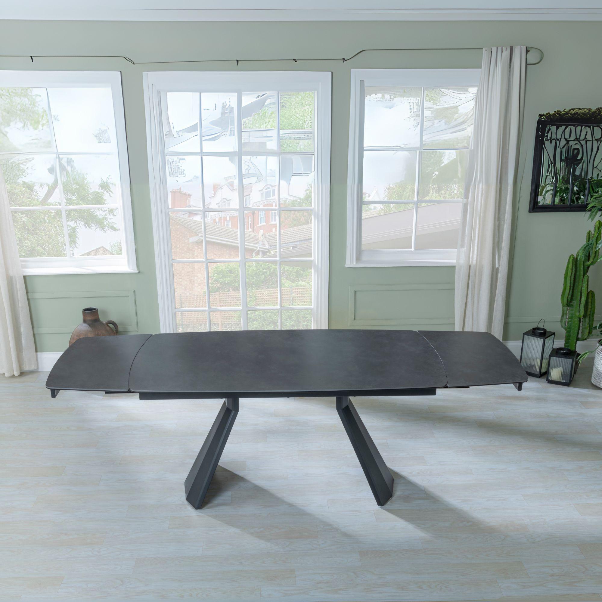 Product photograph of Kinston Black Ceramic Extending Dining Set - Diego Brown Leather Swivel Dining Chair - Get 2 Chairs Free from Choice Furniture Superstore.