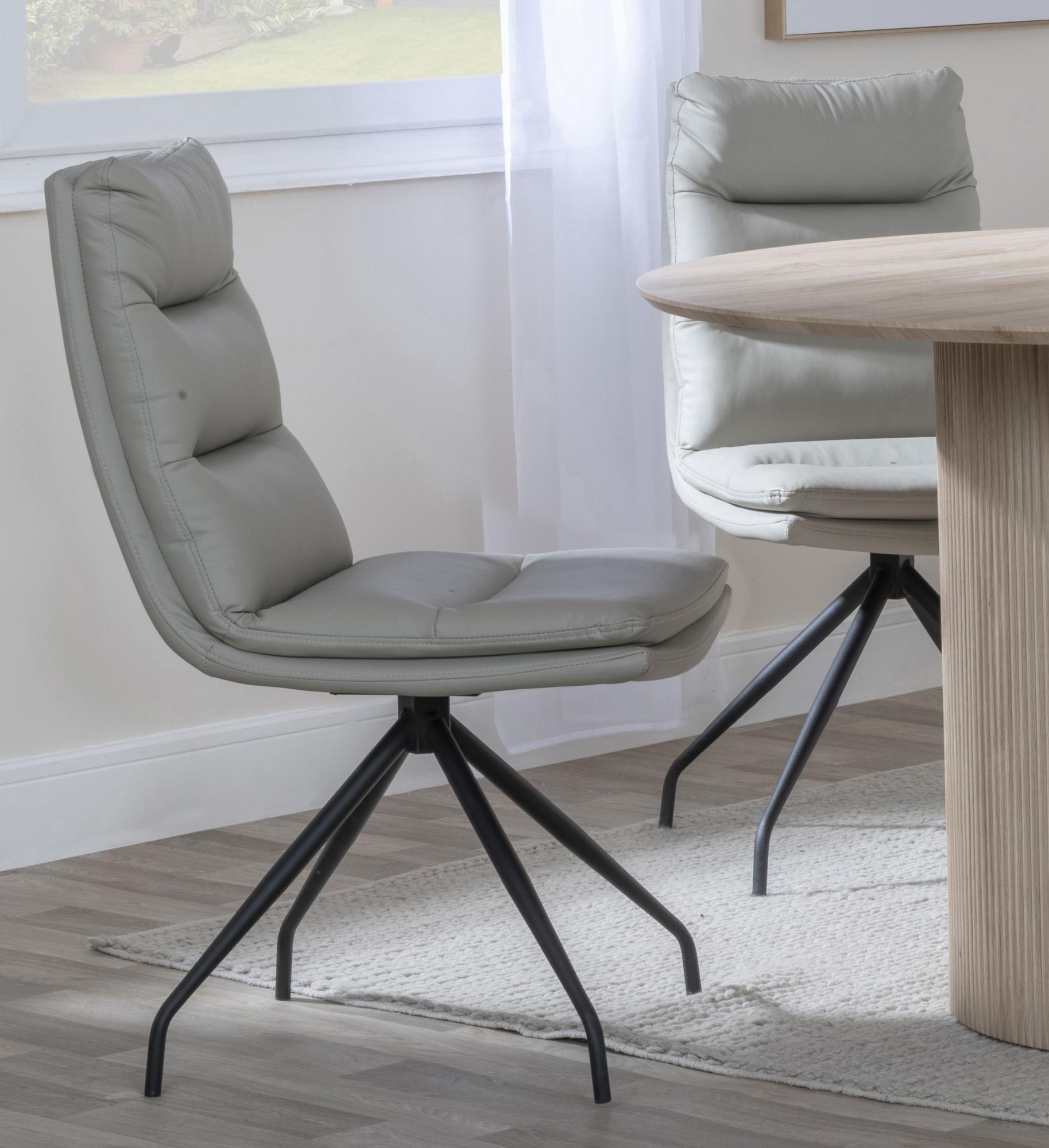 Product photograph of Kinston Black Ceramic Extending Dining Set - Diego Beige Leather Swivel Dining Chair - Get 2 Chairs Free from Choice Furniture Superstore.