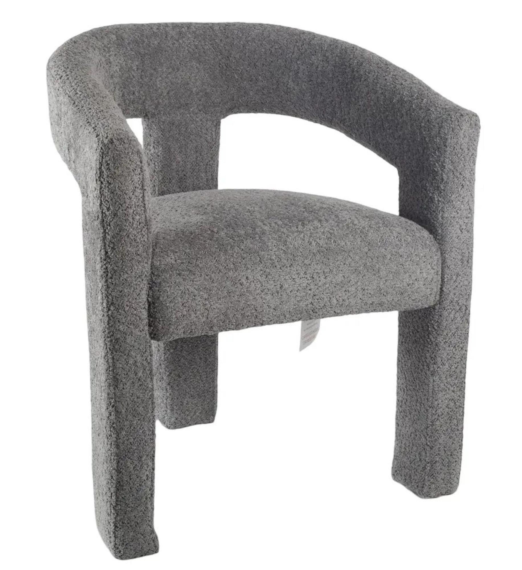Product photograph of Anvik Black Ceramic Extending Dining Set - Kiefer Grey Boucle Fabric Dining Chair from Choice Furniture Superstore.