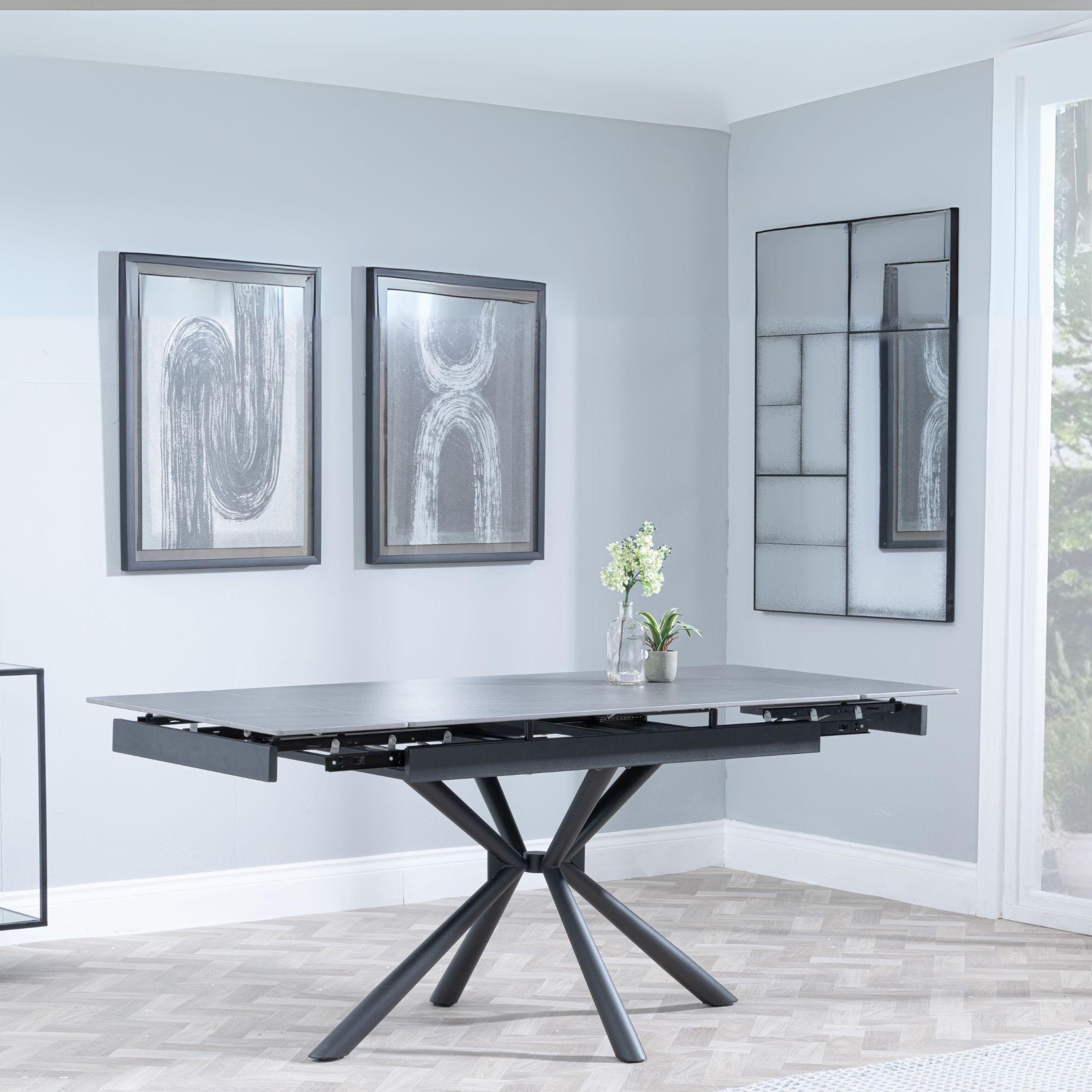 Product photograph of Ripon Black Ceramic Extending Dining Set - Ion Orange Velvet Fabric Swivel Dining Chair from Choice Furniture Superstore.