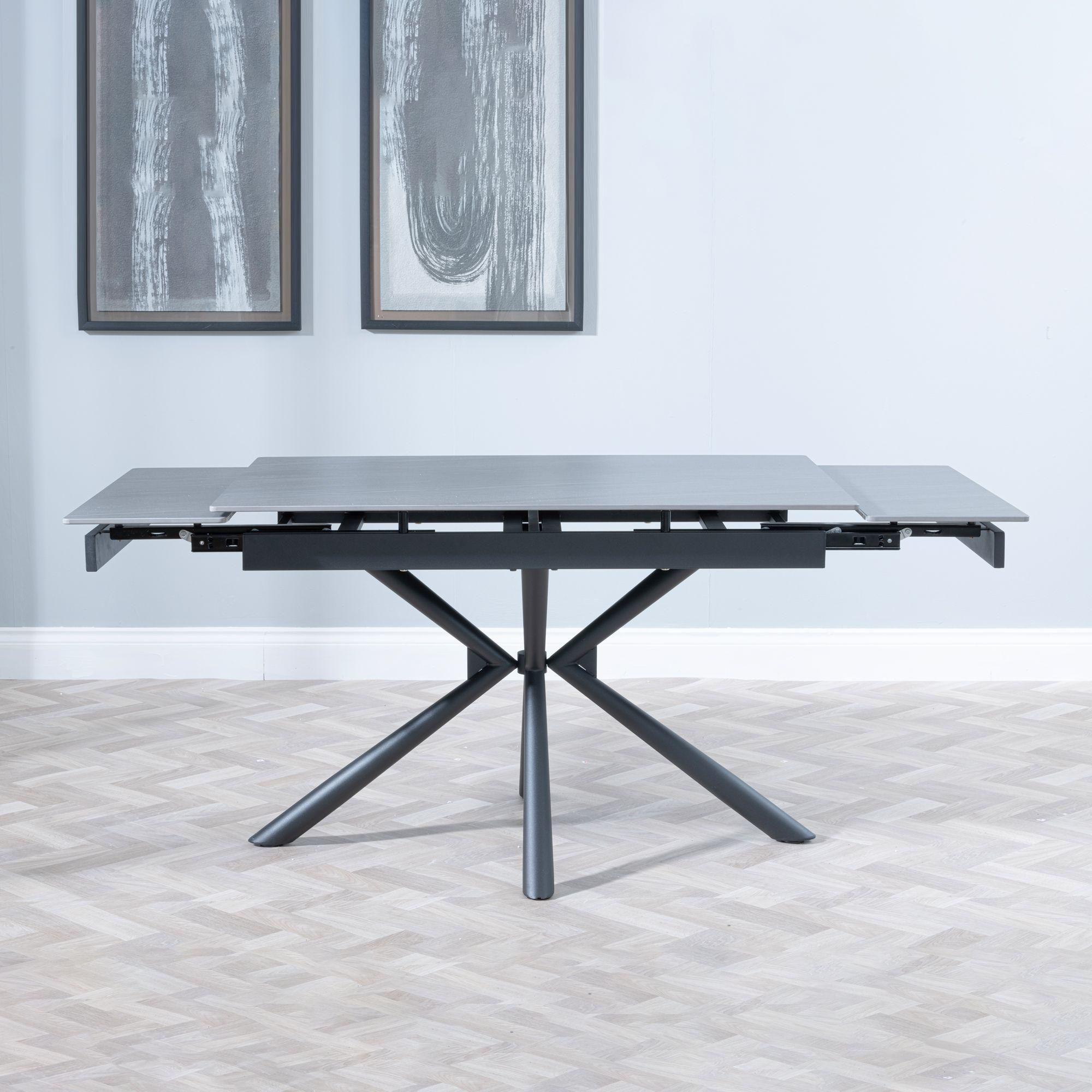 Product photograph of Ripon Black Ceramic Extending Dining Set - Ion Orange Velvet Fabric Swivel Dining Chair from Choice Furniture Superstore.
