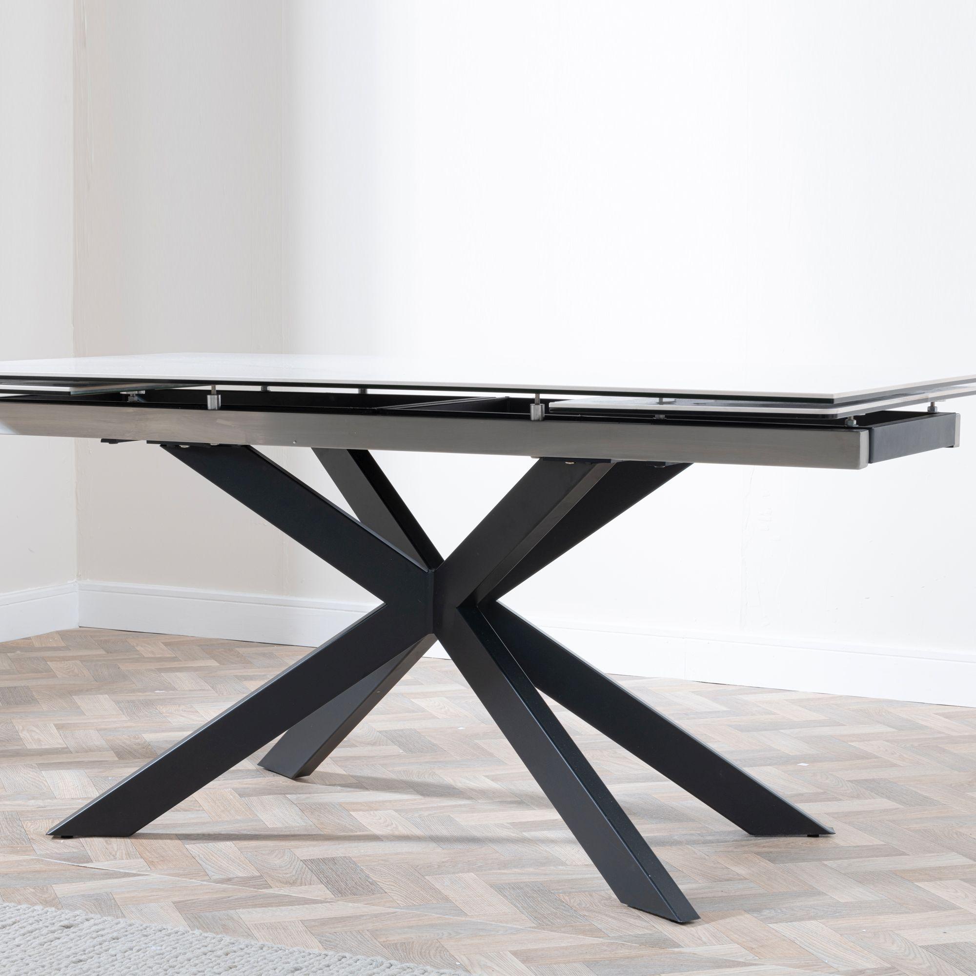 Product photograph of Sutton White Ceramic Extending Dining Set - Darwin Dark Grey Fabric Dining Chair from Choice Furniture Superstore.