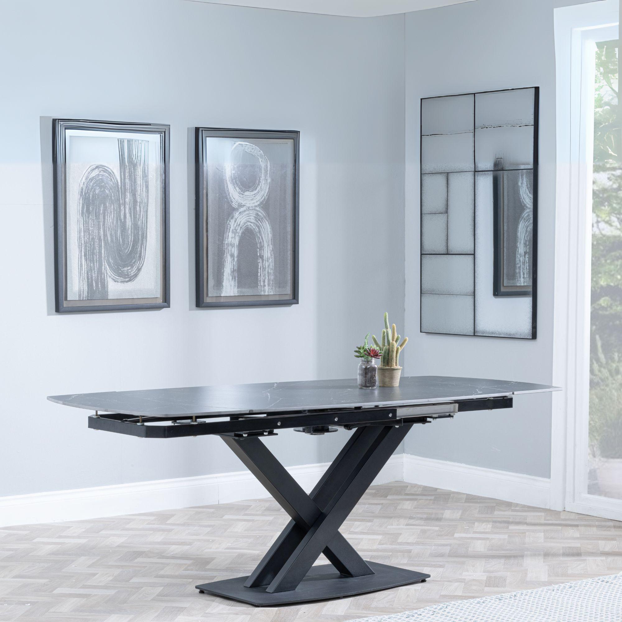 Product photograph of Arctic Black Ceramic Swivel Top Extending Dining Set - Peyton Blue Fabric Dining Chair from Choice Furniture Superstore.