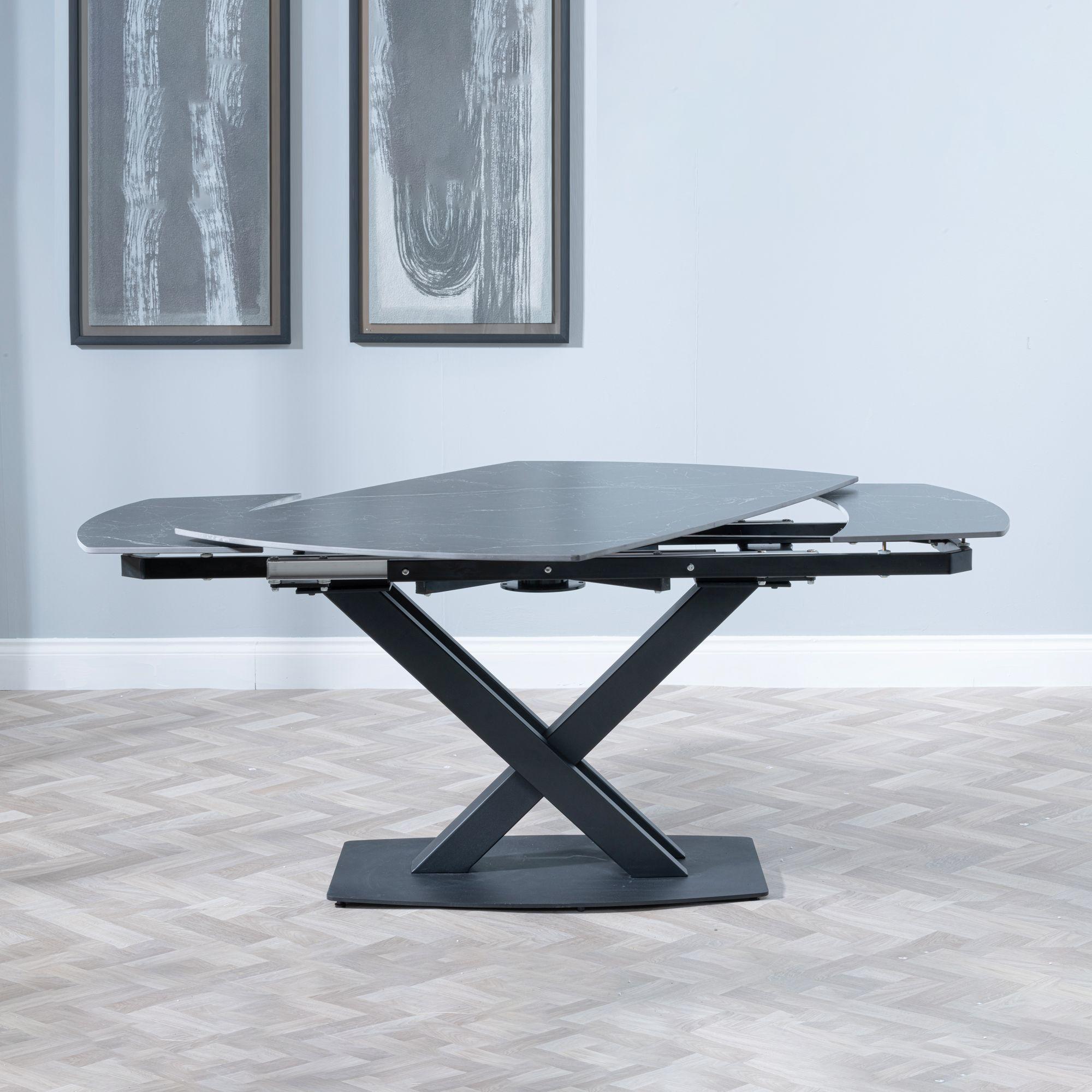 Product photograph of Arctic Black Ceramic Swivel Top Extending Dining Set - Peyton Blue Fabric Dining Chair from Choice Furniture Superstore.