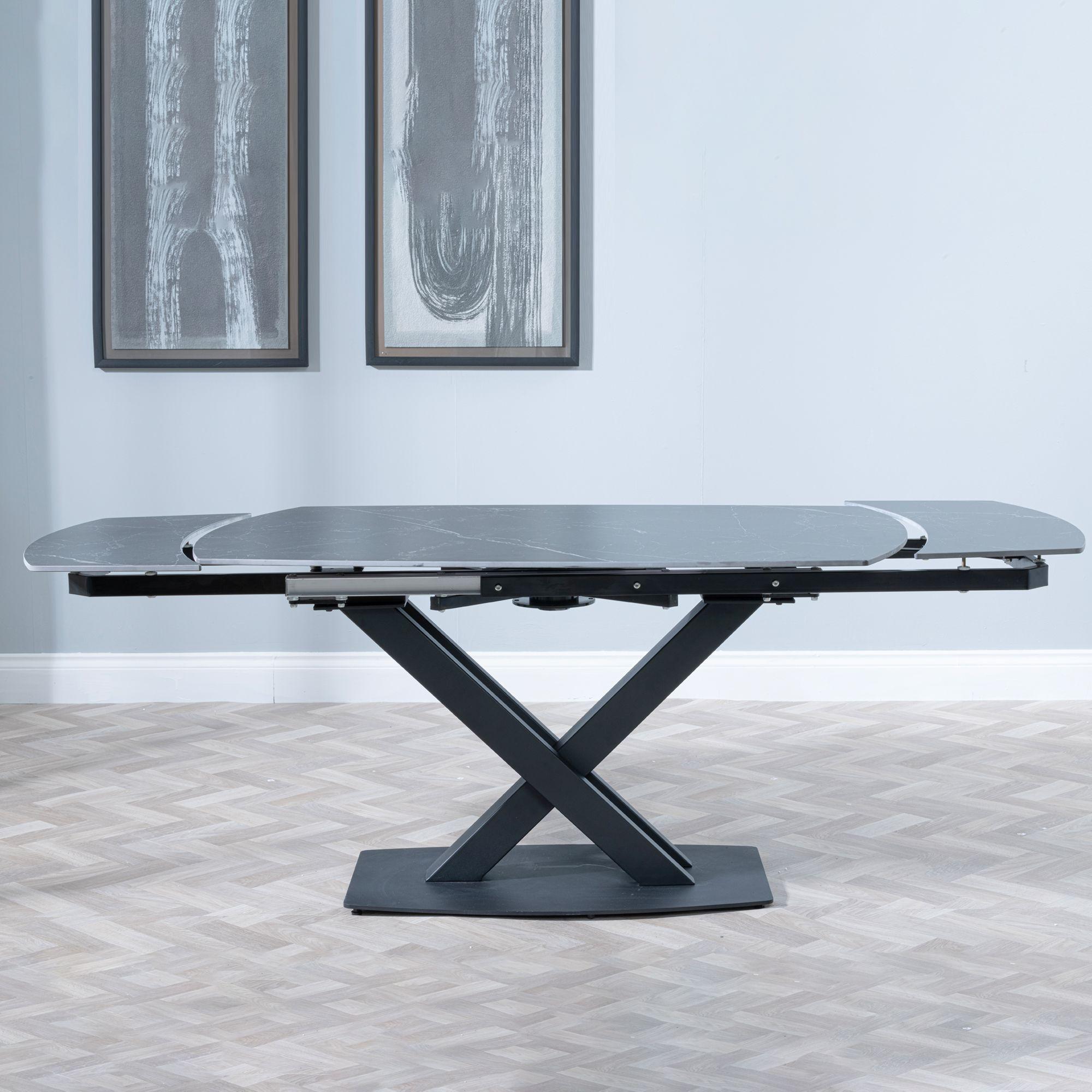 Product photograph of Arctic Black Ceramic Swivel Top Extending Dining Set - Peyton Grey Fabric Dining Chair from Choice Furniture Superstore.