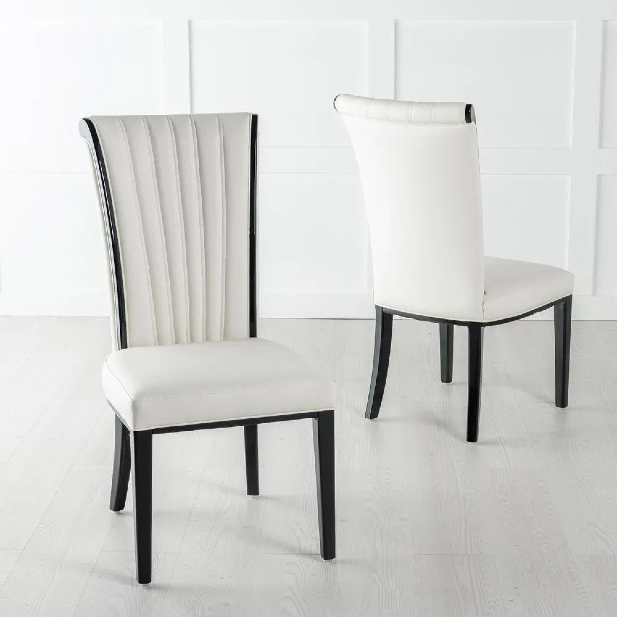 Product photograph of Carrera 4 Seater White Marble Round Dining Set - 4 Cadiz White Leather Dining Chair from Choice Furniture Superstore.