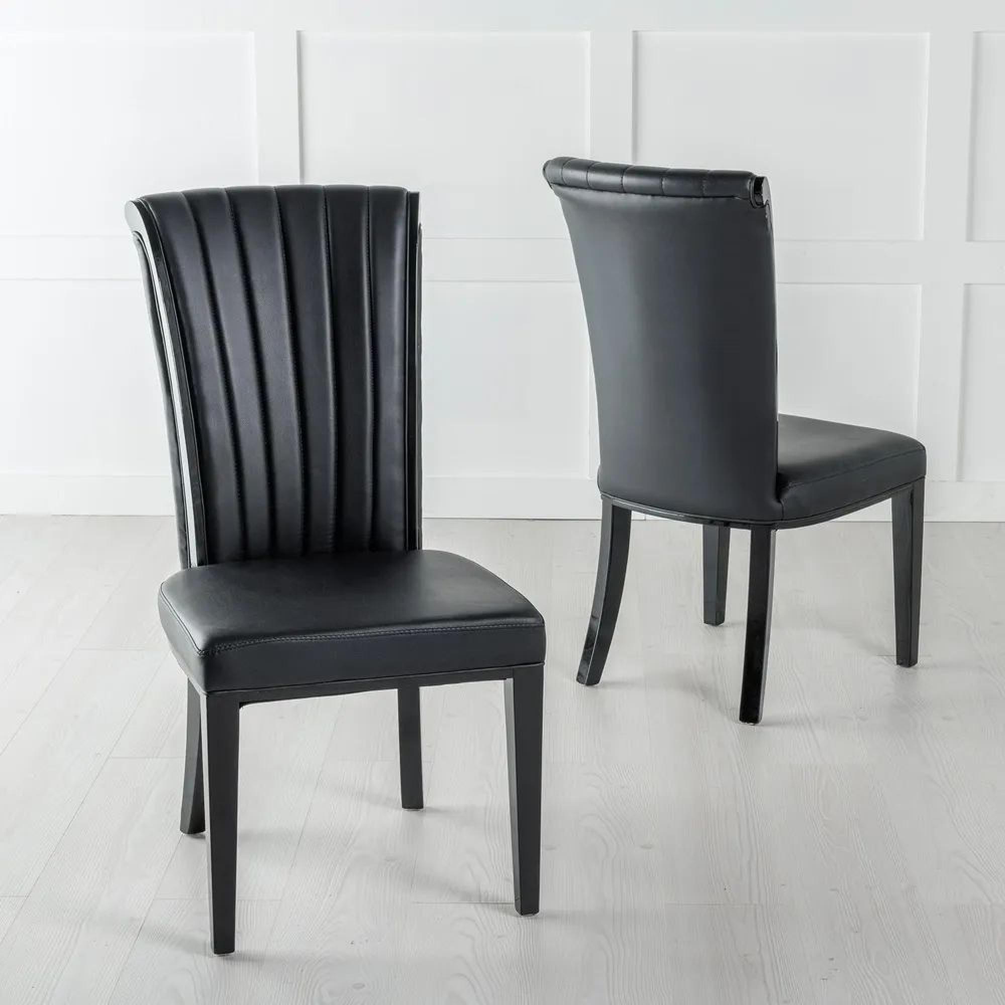 Product photograph of Carrera 4 Seater White Marble Round Dining Set - 4 Cadiz Black Leather Dining Chair from Choice Furniture Superstore.