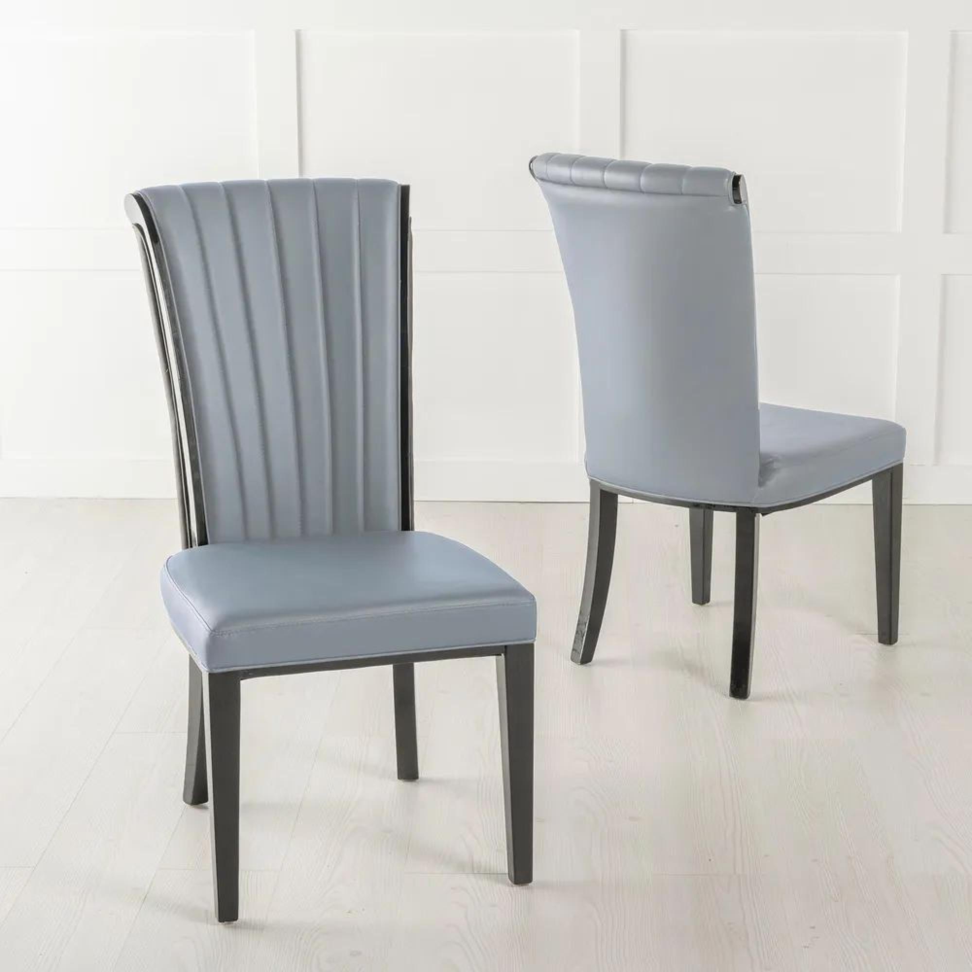 Product photograph of Carrera 4 Seater White Marble Round Dining Set - 4 Cadiz Grey Leather Dining Chair from Choice Furniture Superstore.