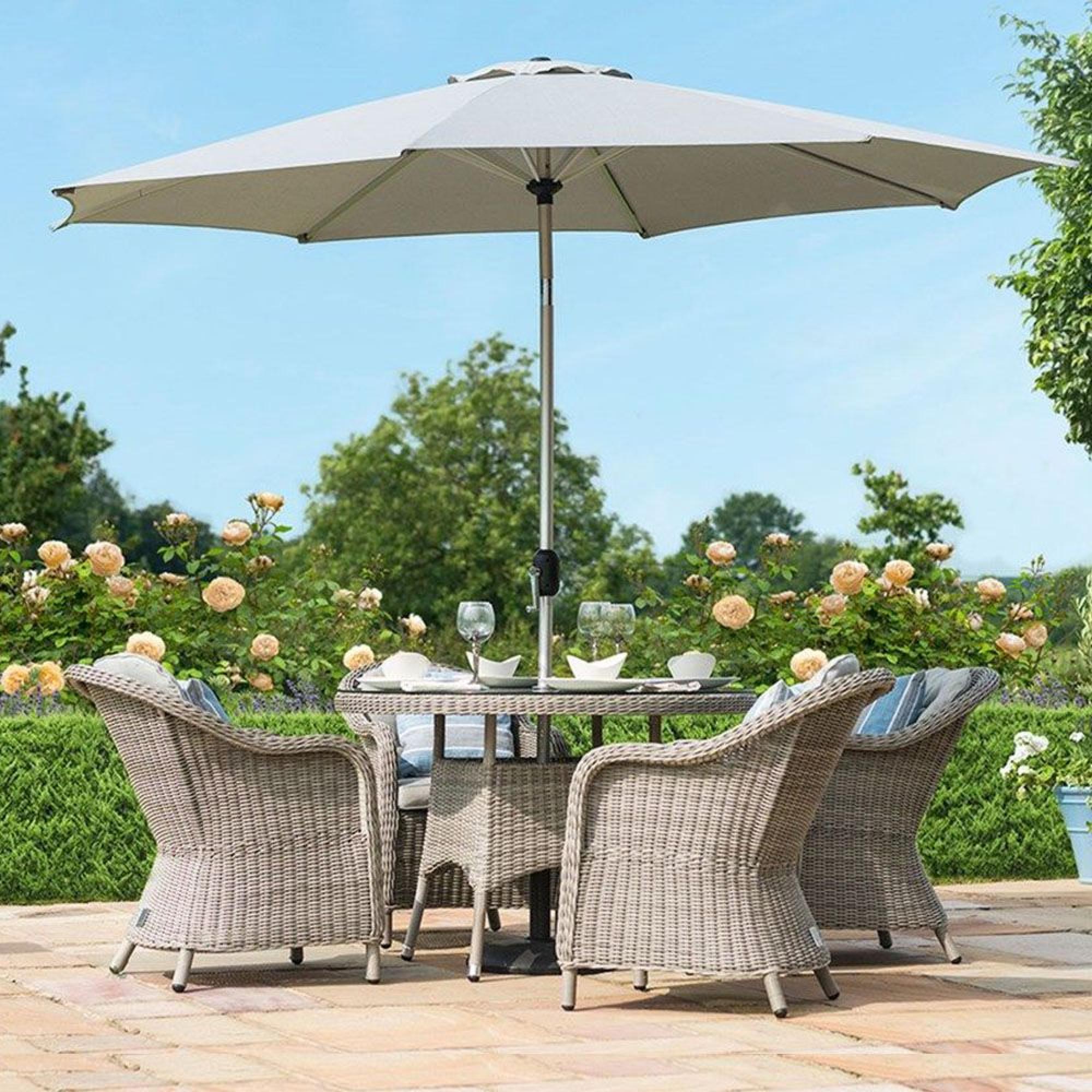 Product photograph of Maze Oxford Heritage Rattan 4 Seat Round Dining Set from Choice Furniture Superstore.