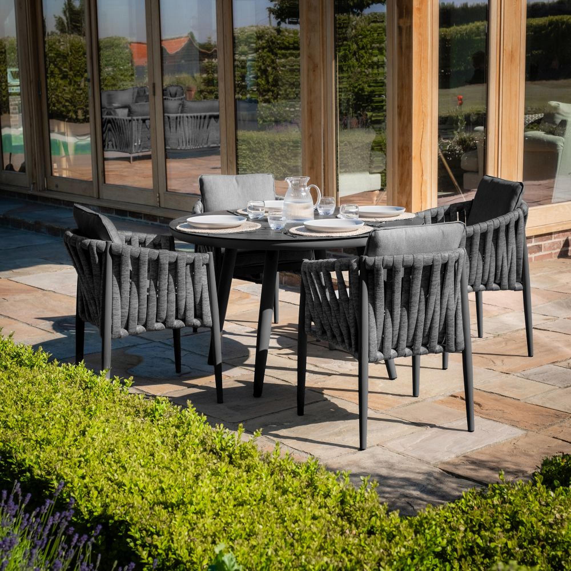 Product photograph of Maze Milan Charcoal 4 Seat Round Dining Set from Choice Furniture Superstore.