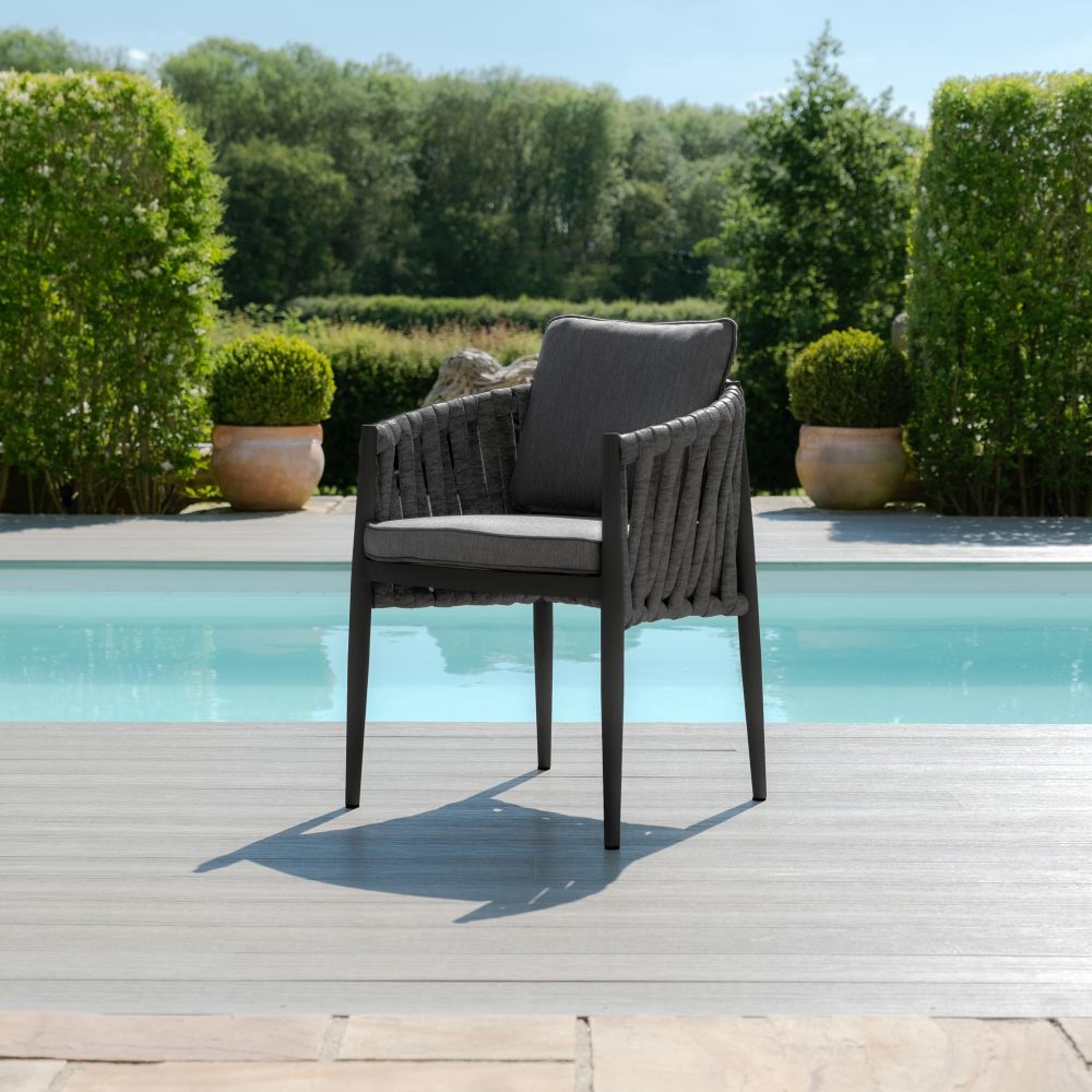 Product photograph of Maze Milan Charcoal 4 Seat Round Dining Set from Choice Furniture Superstore.