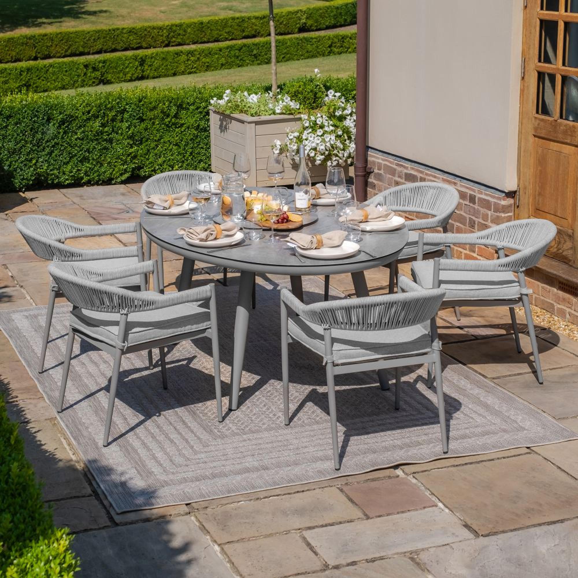 Product photograph of Maze Florence Cool Linen 6 Seat Lazy Susan Oval Dining Set from Choice Furniture Superstore.
