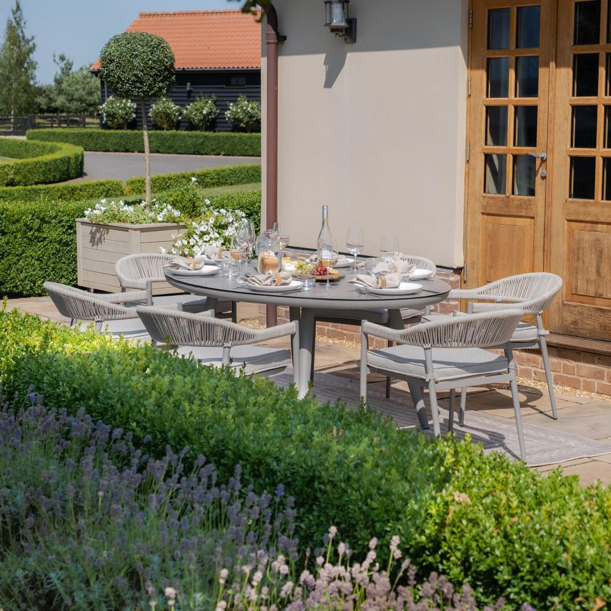 Product photograph of Maze Florence Cool Linen 6 Seat Lazy Susan Oval Dining Set from Choice Furniture Superstore.