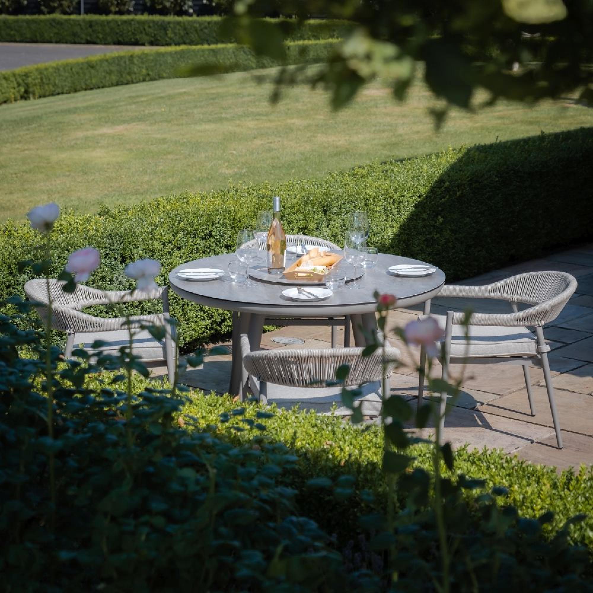 Product photograph of Maze Florence Cool Linen 4 Seat Lazy Susan Round Dining Set from Choice Furniture Superstore.