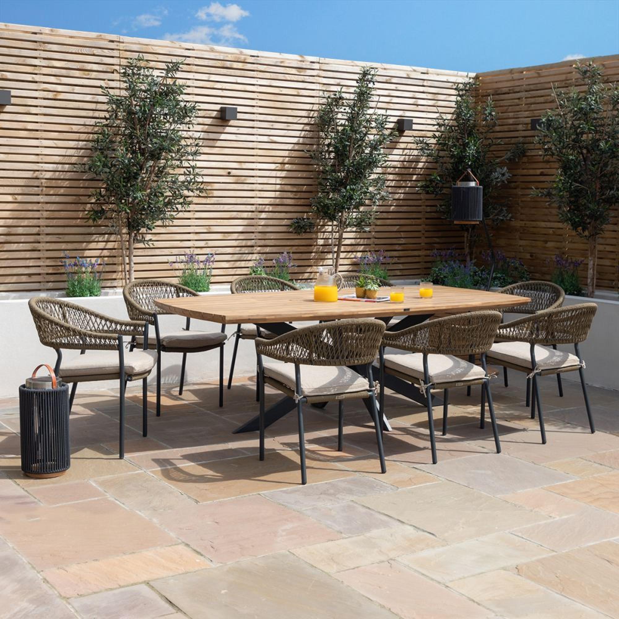 Product photograph of Maze New Bali Sandstone 8 Seat Oval Dining Set from Choice Furniture Superstore.
