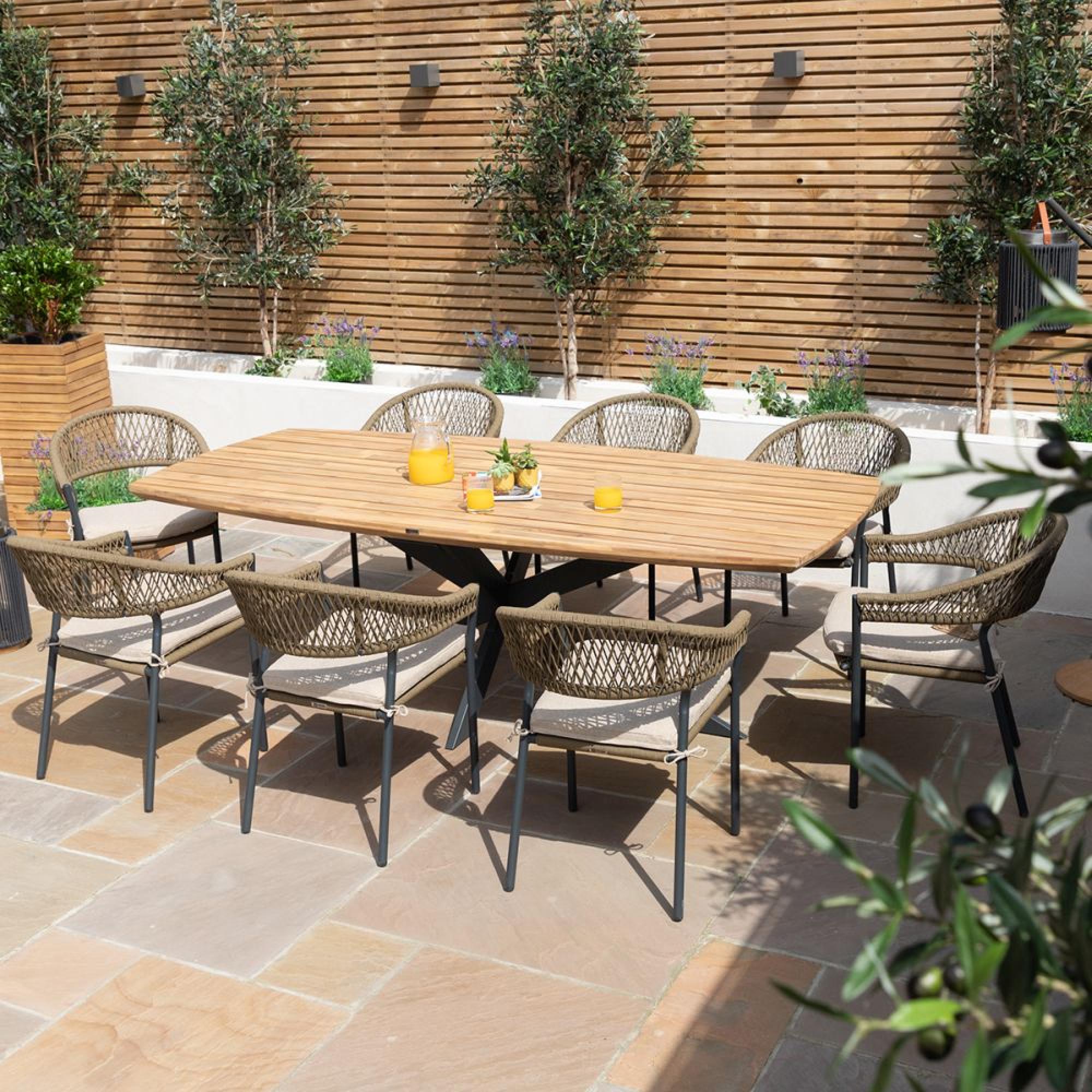 Product photograph of Maze New Bali Sandstone 8 Seat Oval Dining Set from Choice Furniture Superstore.